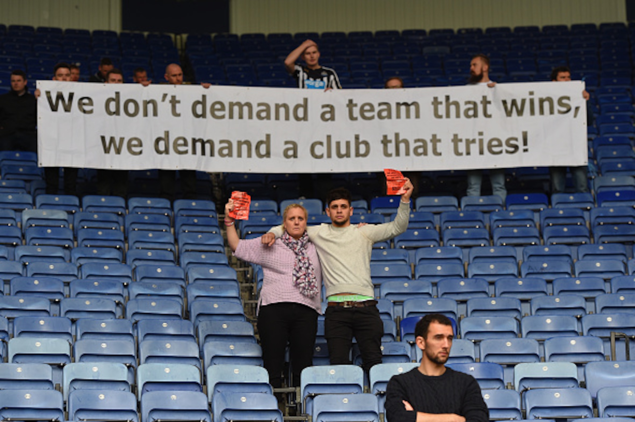LEICESTER, ENGLAND - MAY 02:  Newcastle fans protest against owner Mike Ashley during the Barclays Premier League match between Leicester City and Newcastle United at The King Power Stadium on May 2, 2015 in Leicester, England.  (Photo by Michael Regan/Ge