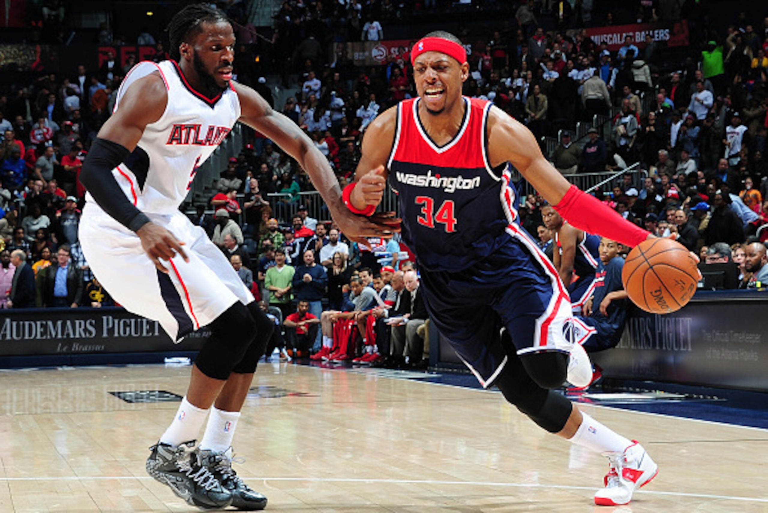ATLANTA, GA - FEBRUARY 4: Paul Pierce #34 of the Washington Wizards drives against DeMarre Carroll #5 of the Atlanta Hawks on February 4, 2015 at Philips Arena in Atlanta, Georgia. NOTE TO USER: User expressly acknowledges and agrees that, by downloading ATLANTA, GA - FEBRUARY 4: Paul Pierce #34 of the Washington Wizards drives against DeMarre Carroll #5 of the Atlanta Hawks on February 4, 2015 at Philips Arena in Atlanta, Georgia. NOTE TO USER: User expressly acknowledges and agrees that, by downloading