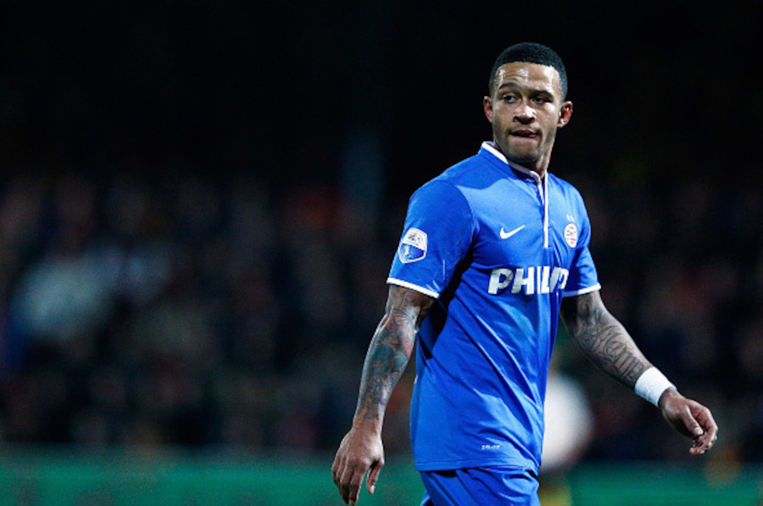DEVENTER, NETHERLANDS - MARCH 07:  Memphis Depay of PSV looks on during the Dutch Eredivisie match between Go Ahead Eagles and PSV Eindhoven held at the De Adelaarshorst Stadium at  on March 7, 2015 in Deventer, Netherlands.  (Photo by Dean Mouhtaropoulos