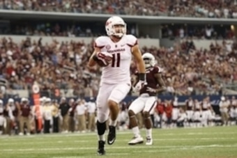 Sep 27, 2014; Arlington, TX, USA; Arkansas Razorbacks receiver A.J. Derby (11) scores a third quarter touchdown against the Texas A&M Aggies at AT&T Stadium. Mandatory Credit: Matthew Emmons-USA TODAY Sports
