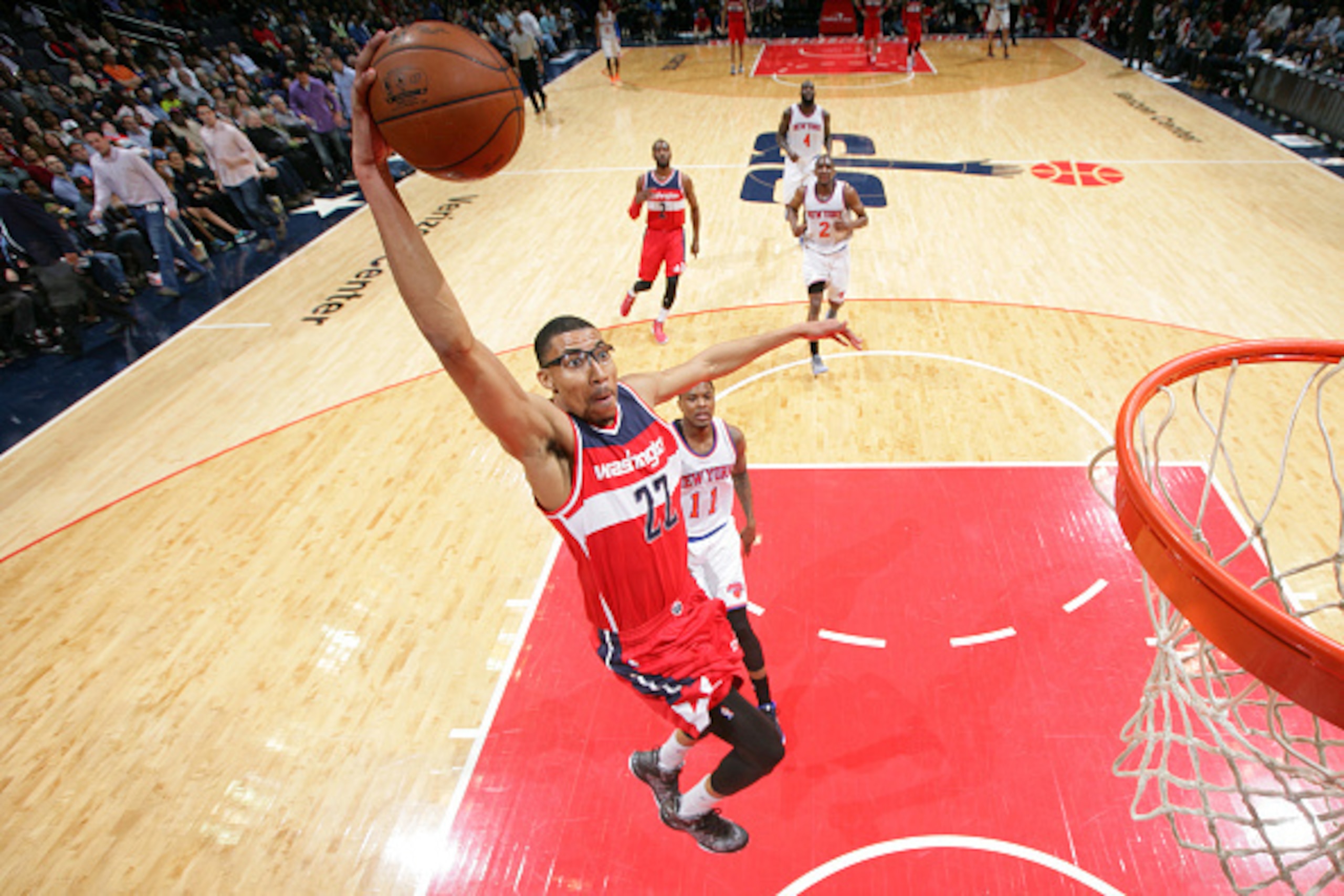 WASHINGTON, DC - APRIL 3: Otto Porter Jr. #22 of the Washington Wizards  shoots against Ricardo Ledo #11 of the New York Knicks during a game at the Verizon Center on April 3, 2015 in Washington, DC. NOTE TO USER: User expressly acknowledges and agrees th