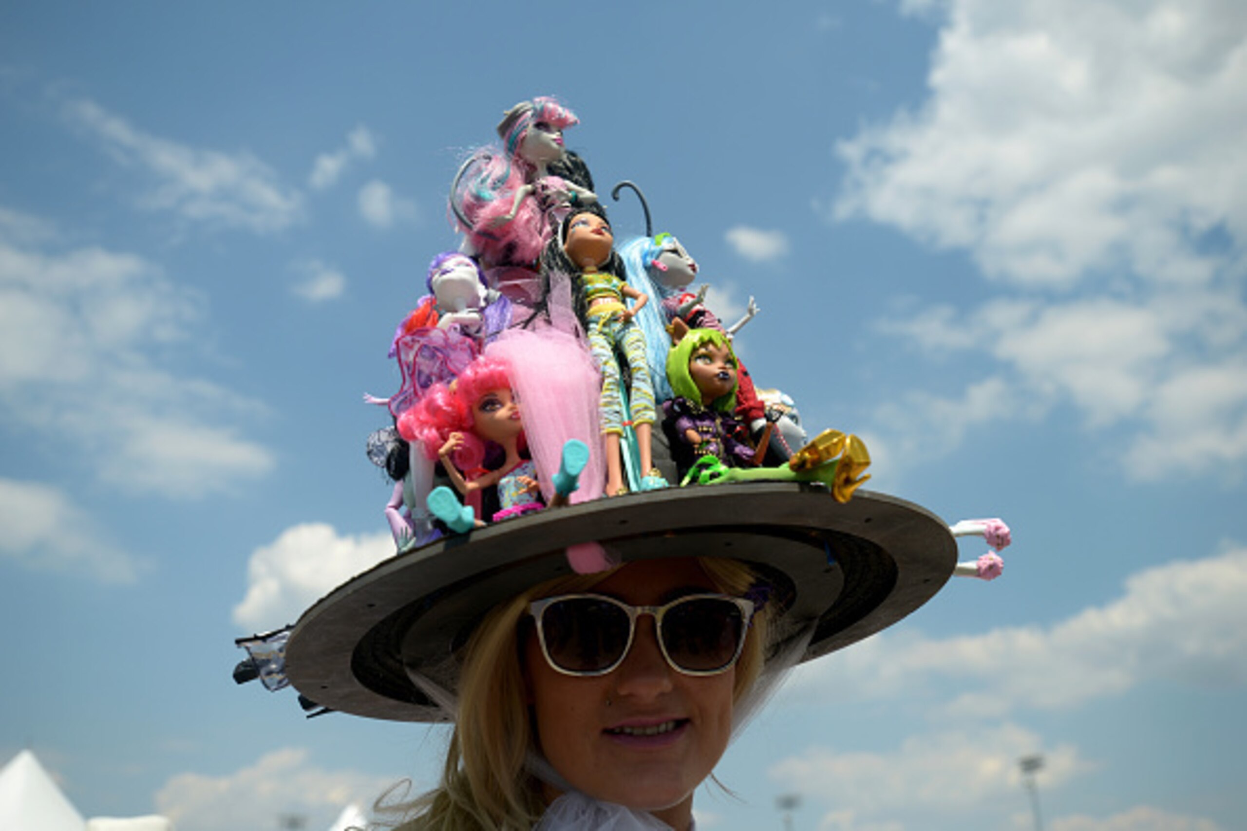 LOUISVILLE, KY - MAY 02:  A woman wearing a festive hat looks on prior to the 141st running of the Kentucky Derby at Churchill Downs on May 2, 2015 in Louisville, Kentucky.  (Photo by Dylan Buell/Getty Images)