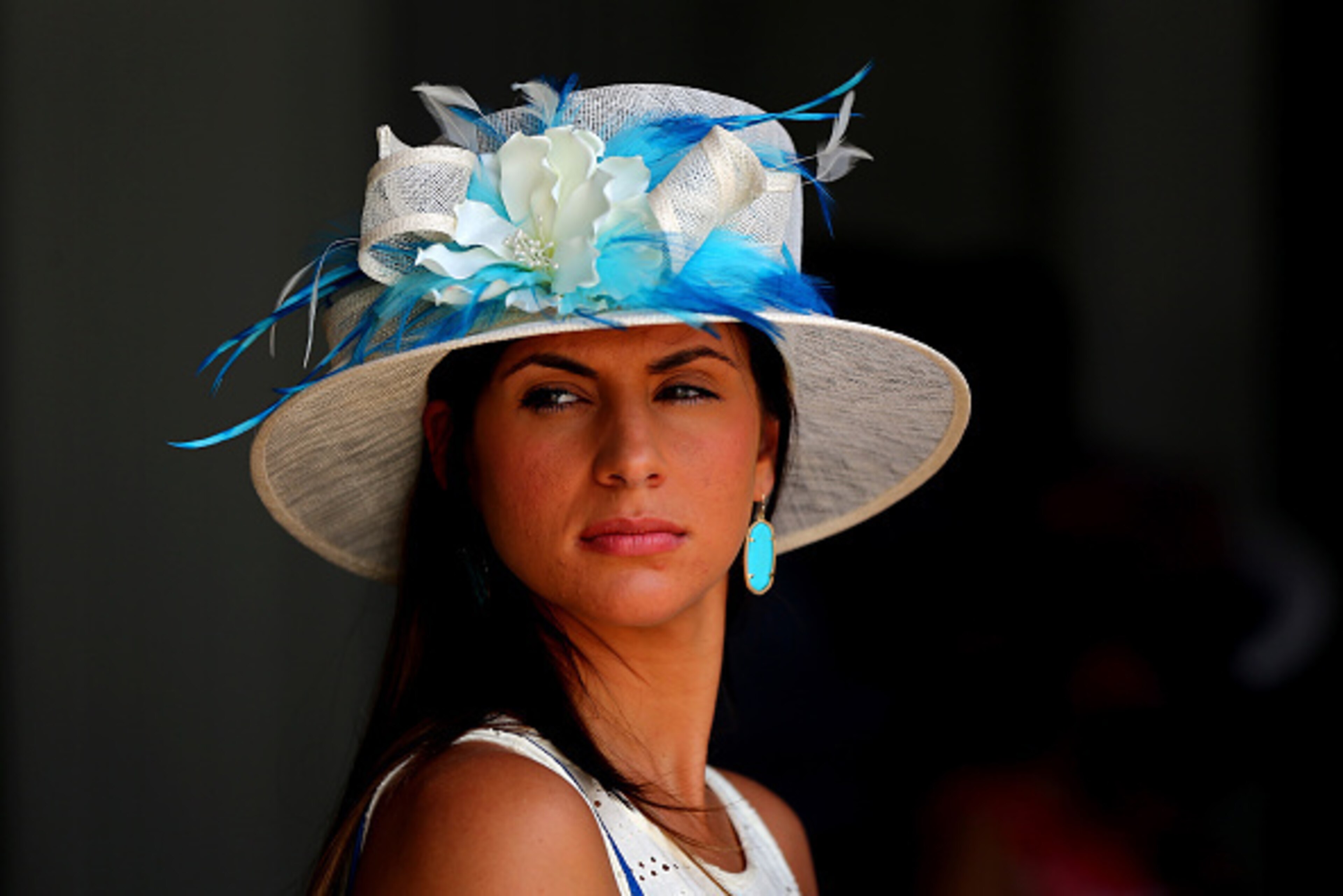LOUISVILLE, KY - MAY 02: A woman wearing a festive hat looks on prior to the 141st running of the Kentucky Derby at Churchill Downs on May 2, 2015 in Louisville, Kentucky. (Photo by Elsa/Getty Images) LOUISVILLE, KY - MAY 02: A woman wearing a festive hat looks on prior to the 141st running of the Kentucky Derby at Churchill Downs on May 2, 2015 in Louisville, Kentucky. (Photo by Elsa/Getty Images)