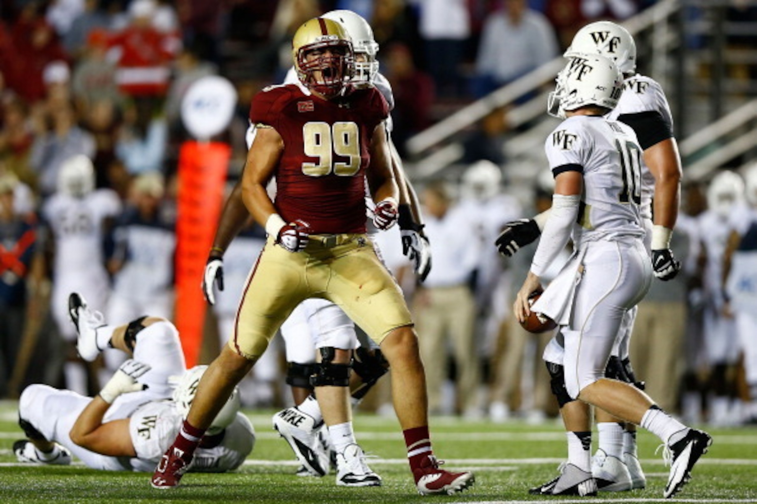 CHESTNUT HILL, MA - SEPTEMBER 6: Brian Mihalik #99 of the Boston College Eagles reacts after sacking Tanner Price #10 of the Wake Forest Demon Deacons in the second quarter during the game on September 6, 2013 at Alumni Stadium in Chestnut Hill, Massachus