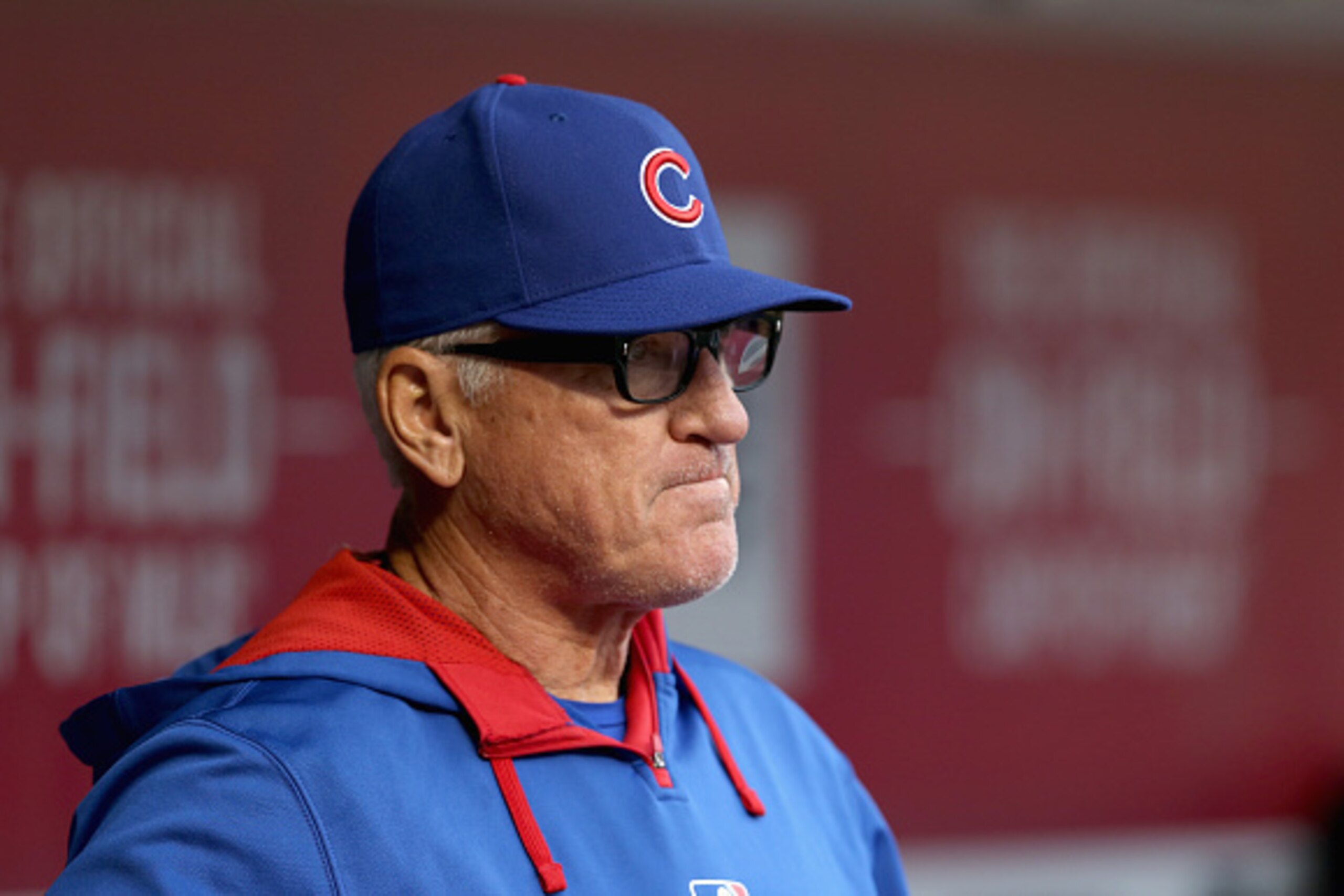 CINCINNATI, OH - APRIL 24:  Joe Maddon the manager of the Chicago Cubs watches the action gainst the Cincinnati Reds at Great American Ball Park on April 24, 2015 in Cincinnati, Ohio.  (Photo by Andy Lyons/Getty Images)
