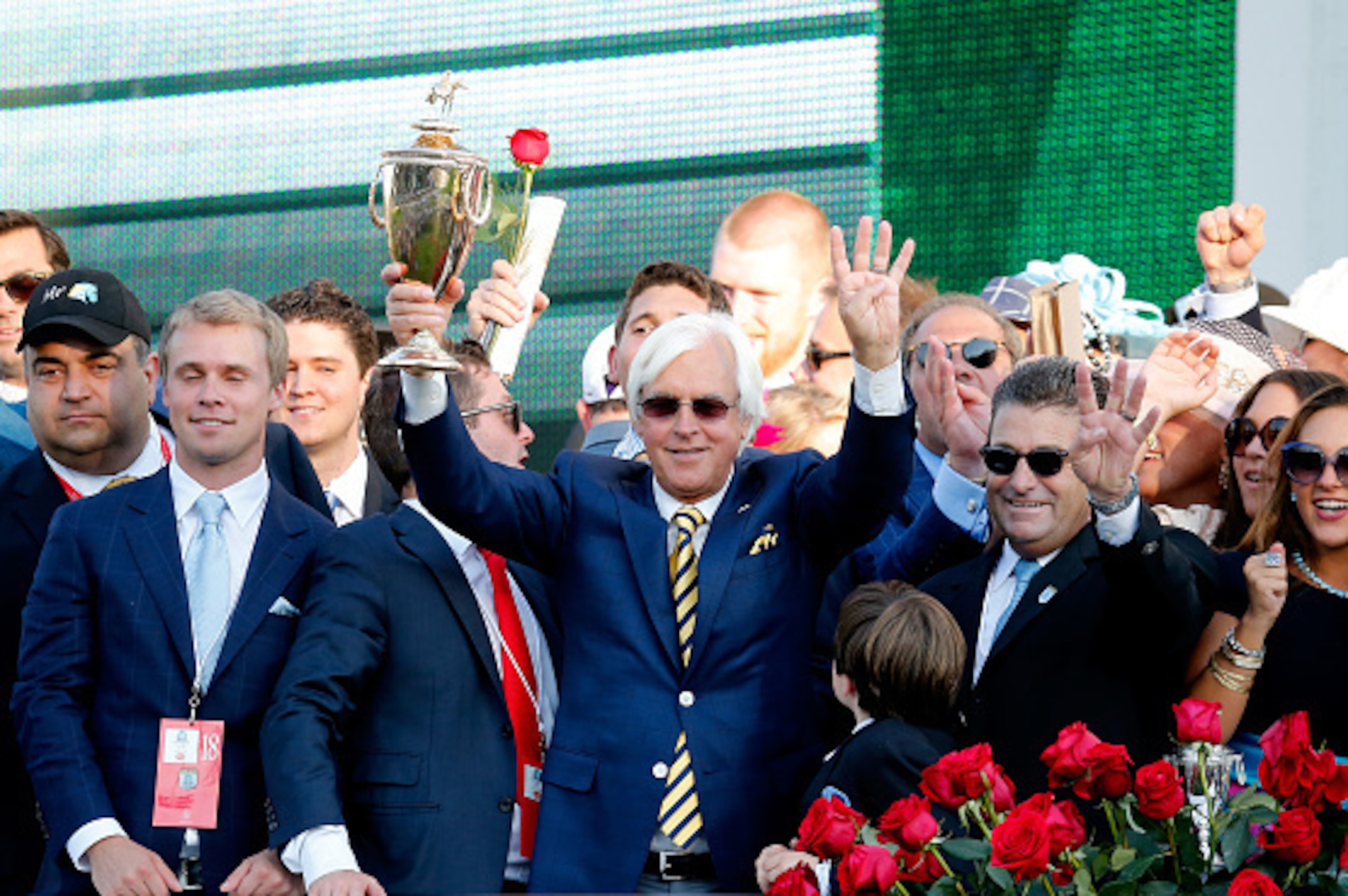 LOUISVILLE, KY - MAY 02:  Trainer Bob Baffert of American Pharoah #18 celebrates with the trophy in winners circle after winning the 141st running of the Kentucky Derby at Churchill Downs on May 2, 2015 in Louisville, Kentucky.  (Photo by Rob Carr/Getty I
