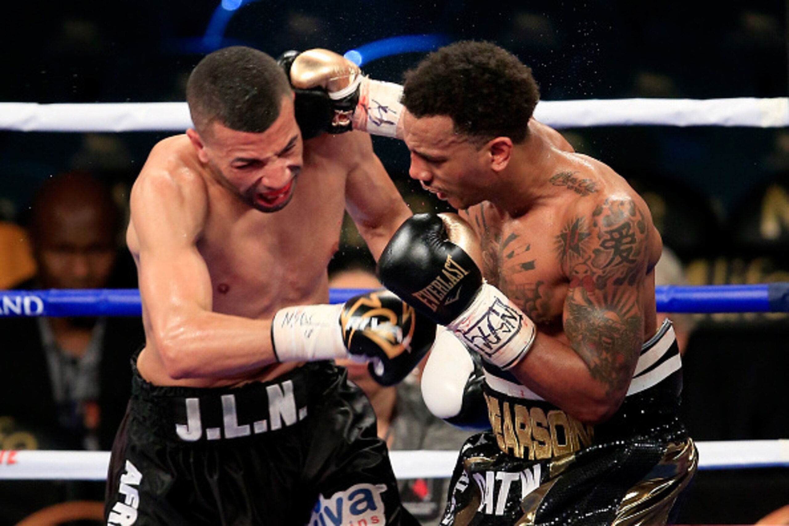 LAS VEGAS, NV - MAY 02:  Chris Pearson (R) throws a right at Said El Harrak during their middleweight bout on May 2, 2015 at MGM Grand Garden Arena in Las Vegas, Nevada.  (Photo by Jamie Squire/Getty Images)
