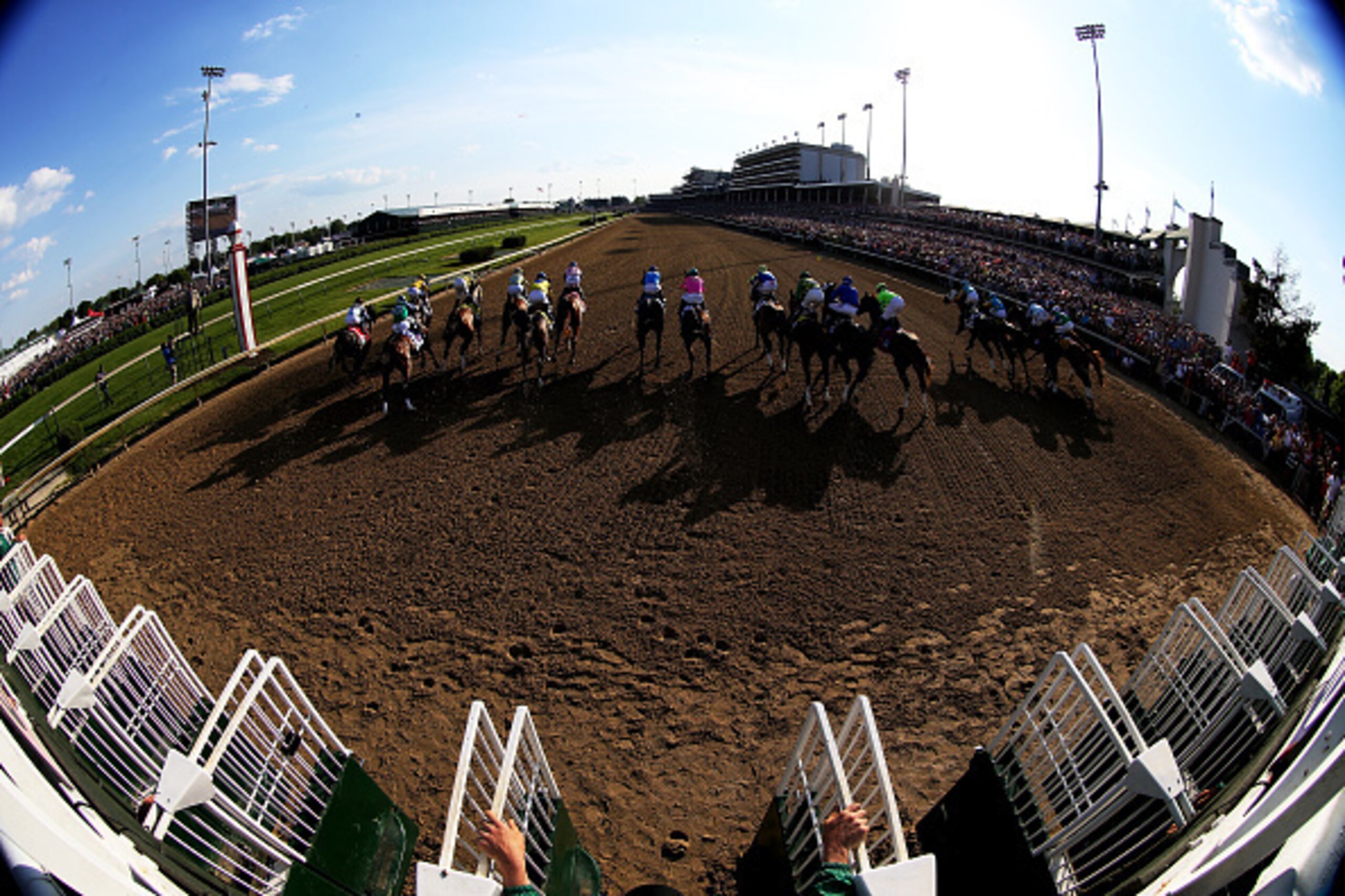 LOUISVILLE, KY - MAY 02:  The field breaks from the gate to start the 141st running of the Kentucky Derby at Churchill Downs on May 2, 2015 in Louisville, Kentucky.  (Photo by Andy Lyons/Getty Images)