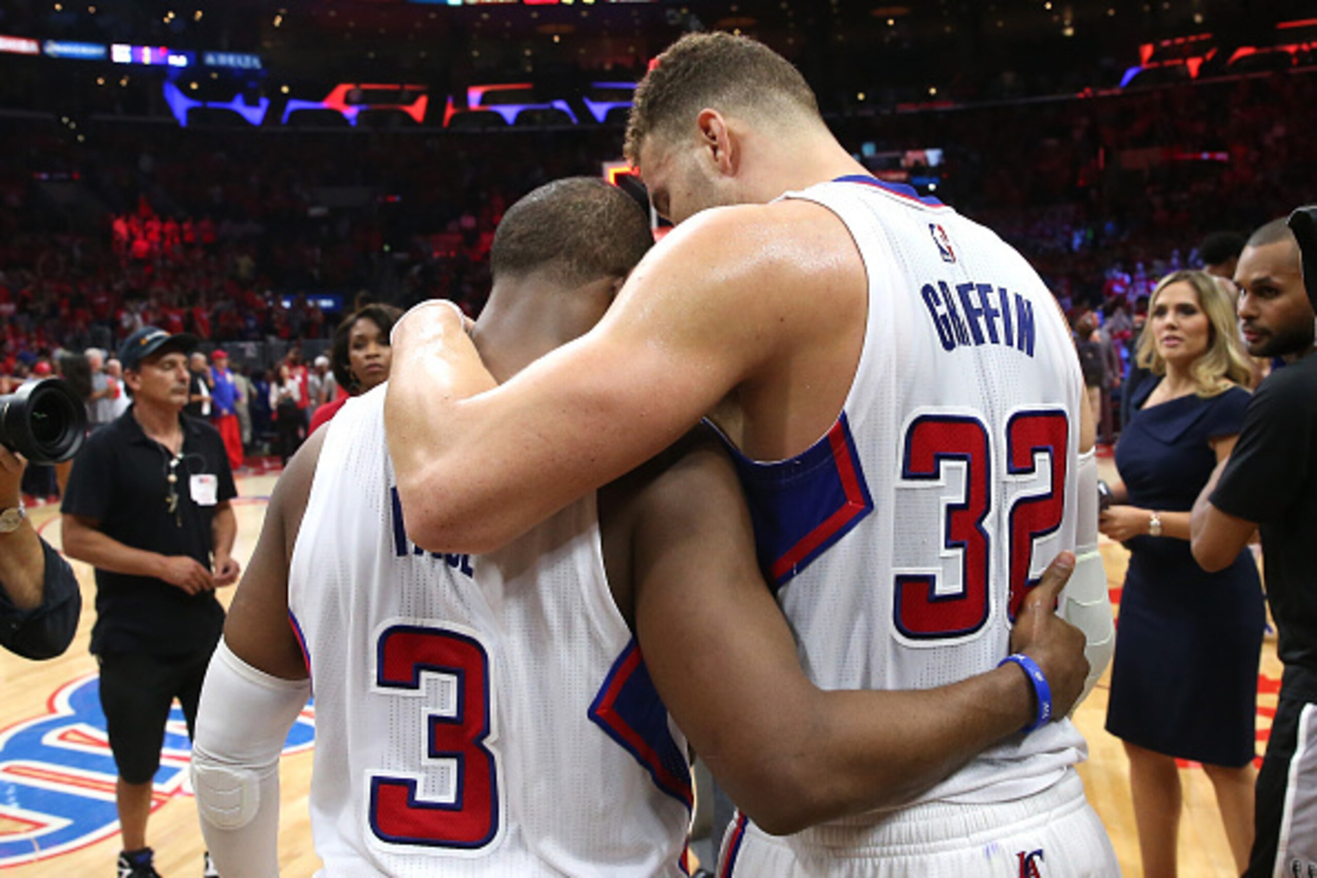 LOS ANGELES, CA - MAY 02:  Blake Griffin #32 and Chris Paul #3 of the Los Angeles Clippers embrace after defeating the San Antonio Spurs after Game Seven of the Western Conference quarterfinals of the 2015 NBA Playoffs at Staples Center on May 2, 2015 in 