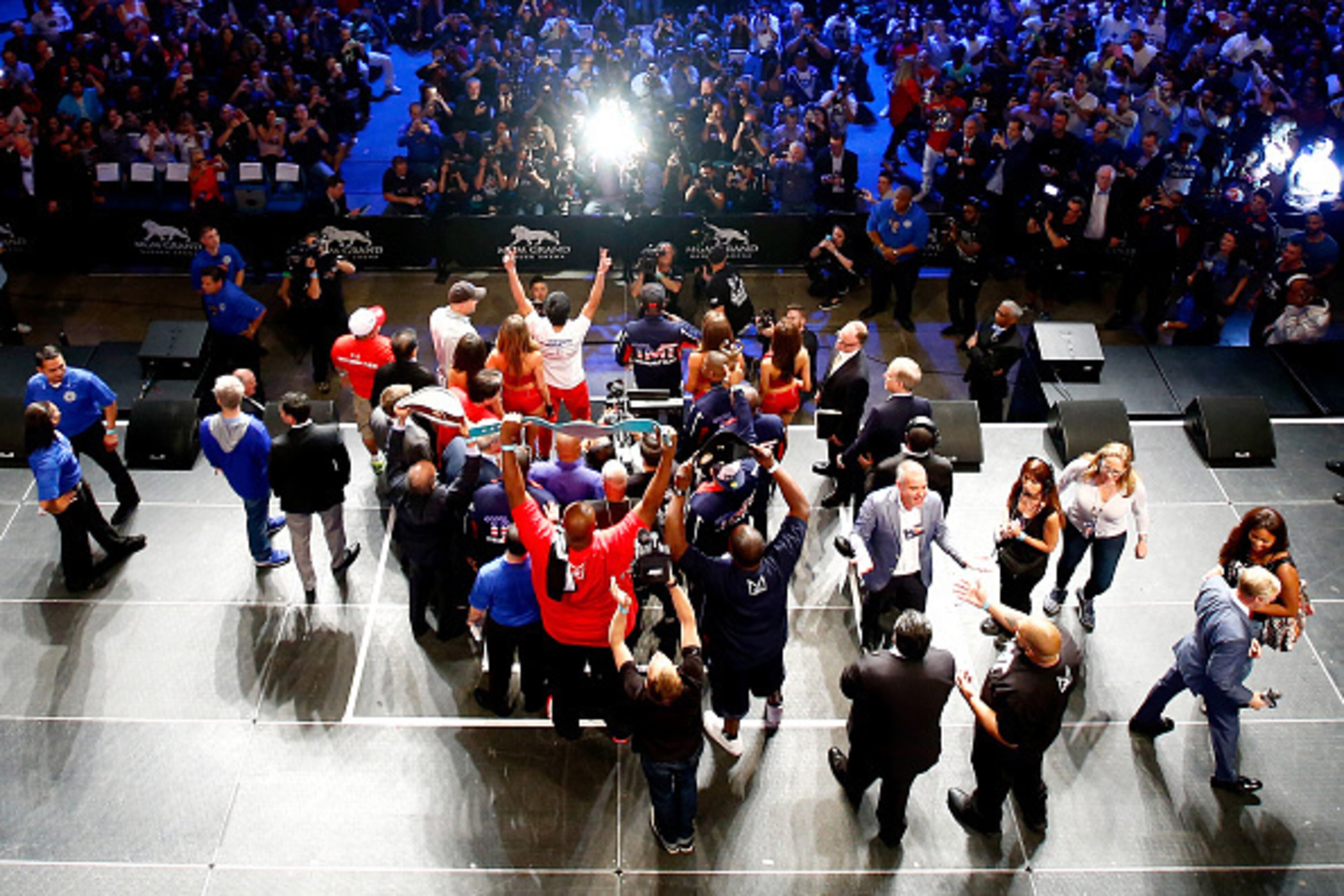 LAS VEGAS, NV - MAY 01: Floyd Mayweather Jr. (R) and Manny Pacquiao pose during their official weigh-in on May 1, 2015 at MGM Grand Garden Arena in Las Vegas, Nevada. The two will face each other in a welterweight unification bout on May 2, 2015 in Las V LAS VEGAS, NV - MAY 01: Floyd Mayweather Jr. (R) and Manny Pacquiao pose during their official weigh-in on May 1, 2015 at MGM Grand Garden Arena in Las Vegas, Nevada. The two will face each other in a welterweight unification bout on May 2, 2015 in Las V