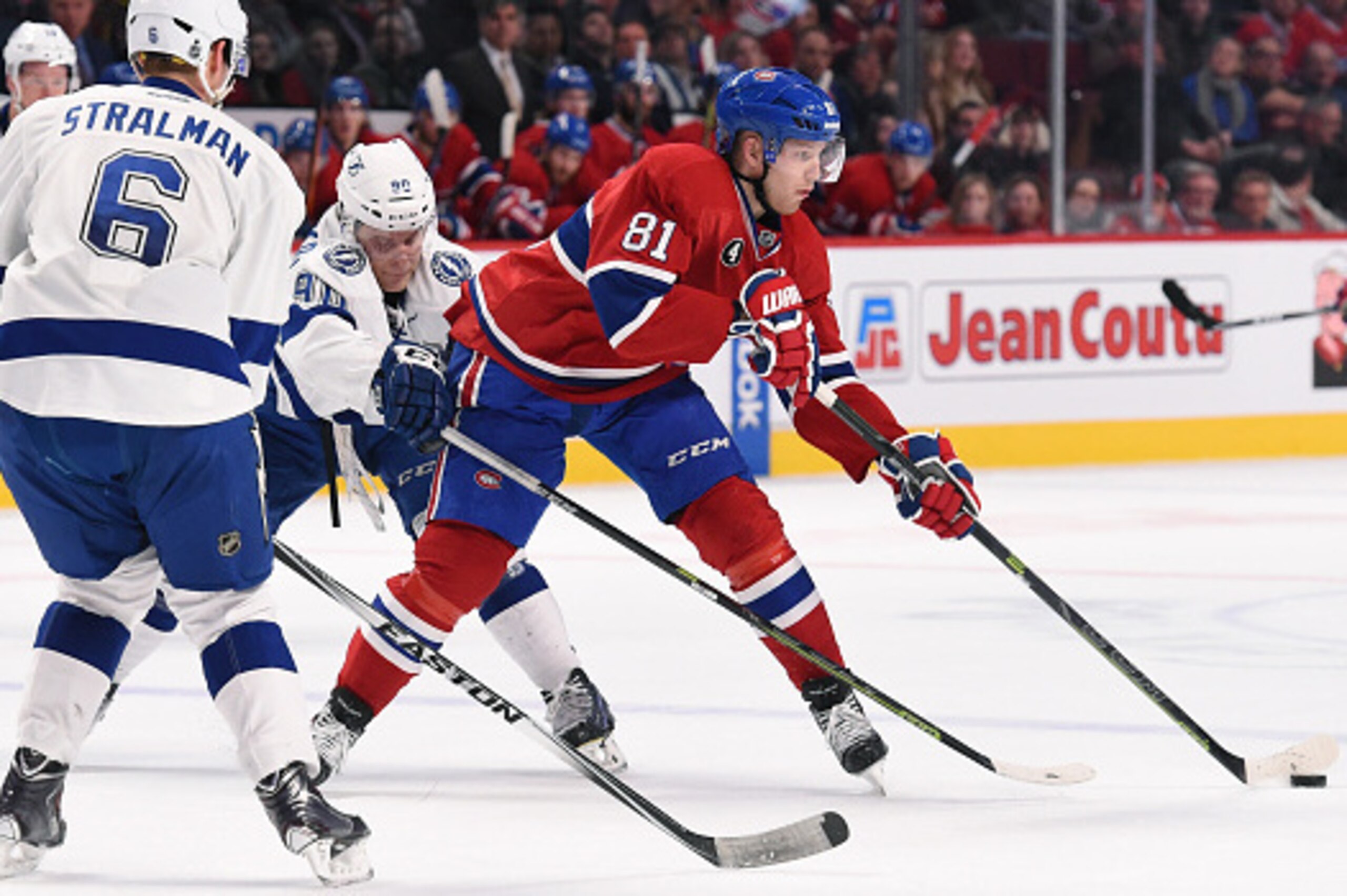 MONTREAL, QC - MARCH 30: Lars Eller #81 of the Montreal Canadiens passes the puck against the Tampa Bay Lightning in the NHL game at the Bell Centre on March 30, 2015 in Montreal, Quebec, Canada. (Photo by Francois Lacasse/NHLI via Getty Images)