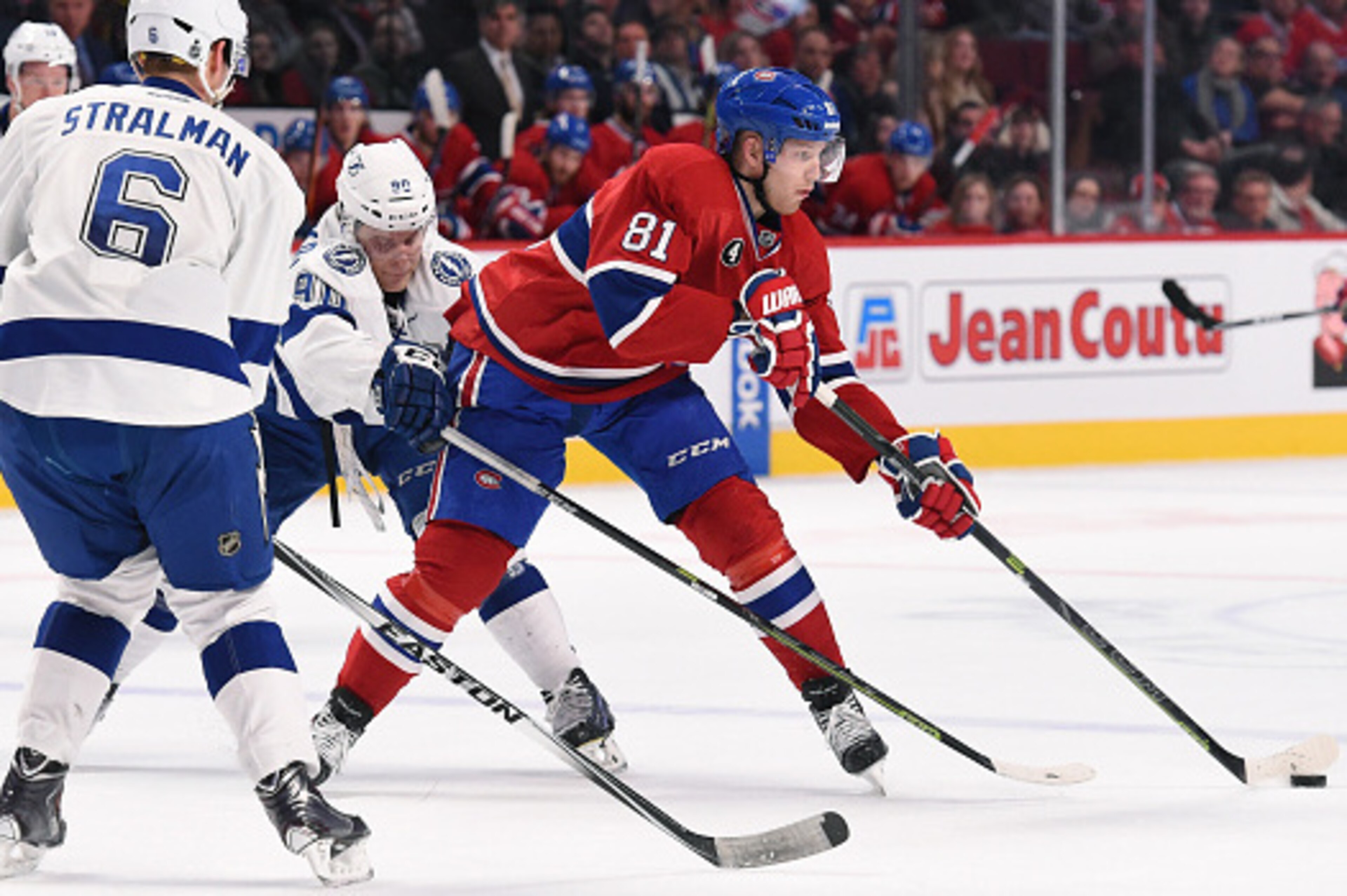 MONTREAL, QC - MARCH 30: Lars Eller #81 of the Montreal Canadiens passes the puck against the Tampa Bay Lightning in the NHL game at the Bell Centre on March 30, 2015 in Montreal, Quebec, Canada. (Photo by Francois Lacasse/NHLI via Getty Images)