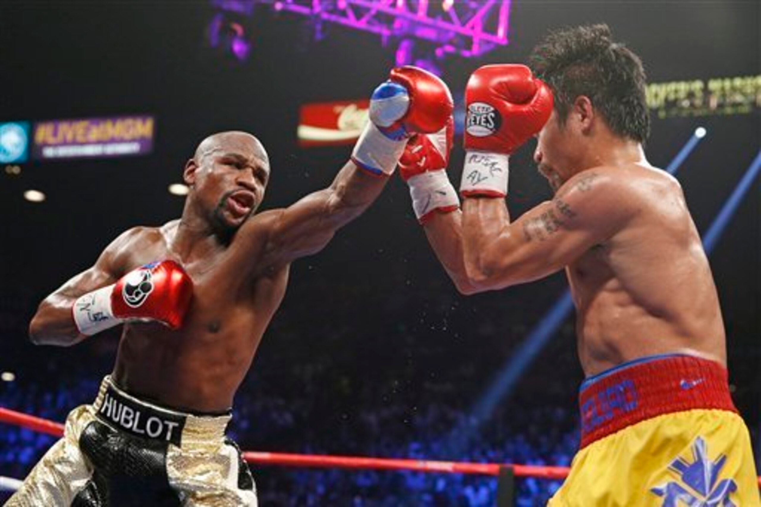 Mayweather kept Pacquiao at a distance for much of the fight. Mayweather kept Pacquiao at a distance for much of the fight.