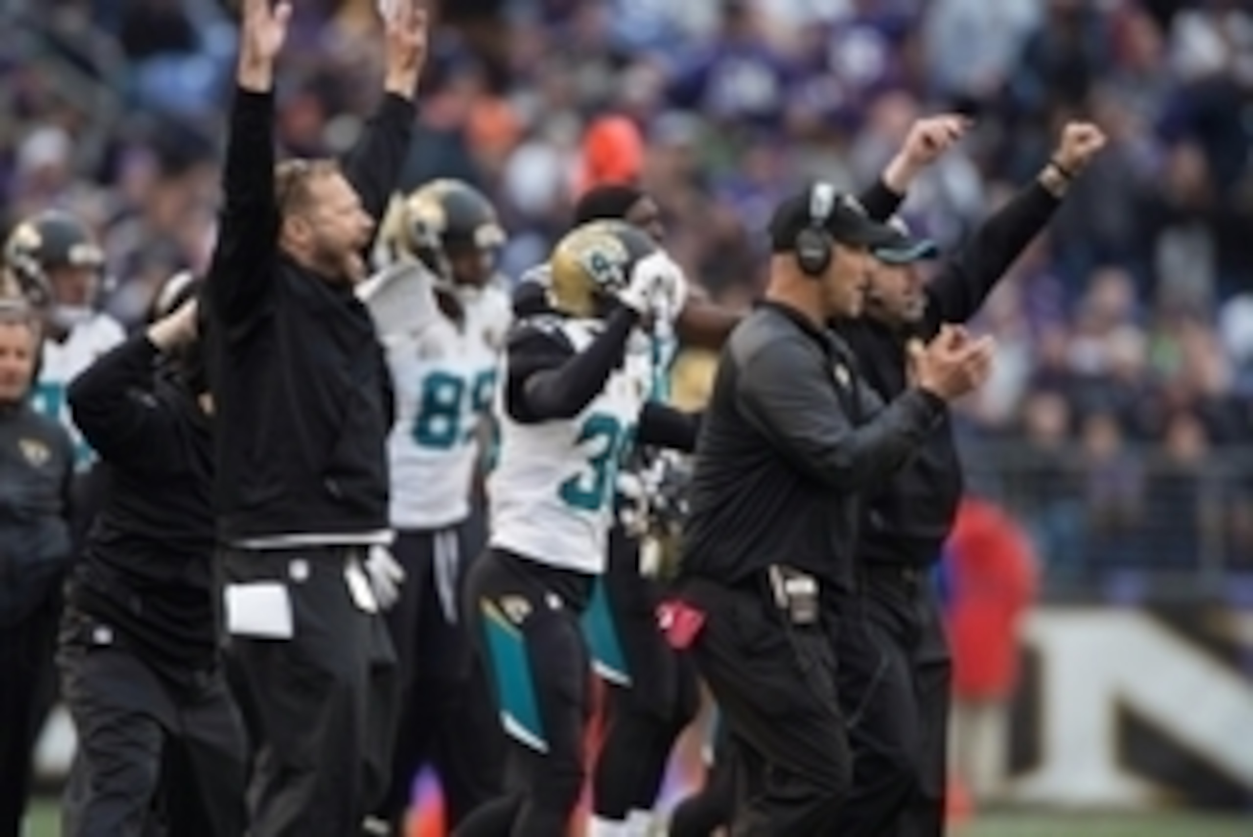 Dec 14, 2014; Baltimore, MD, USA; Jacksonville Jaguars head coach Gus Bradley (right) and the bench celebrate after Baltimore Ravens kicker Justin Tucker (9) missed a field goal during the third quarter at M&T Bank Stadium. Baltimore Ravens defeated Jacks