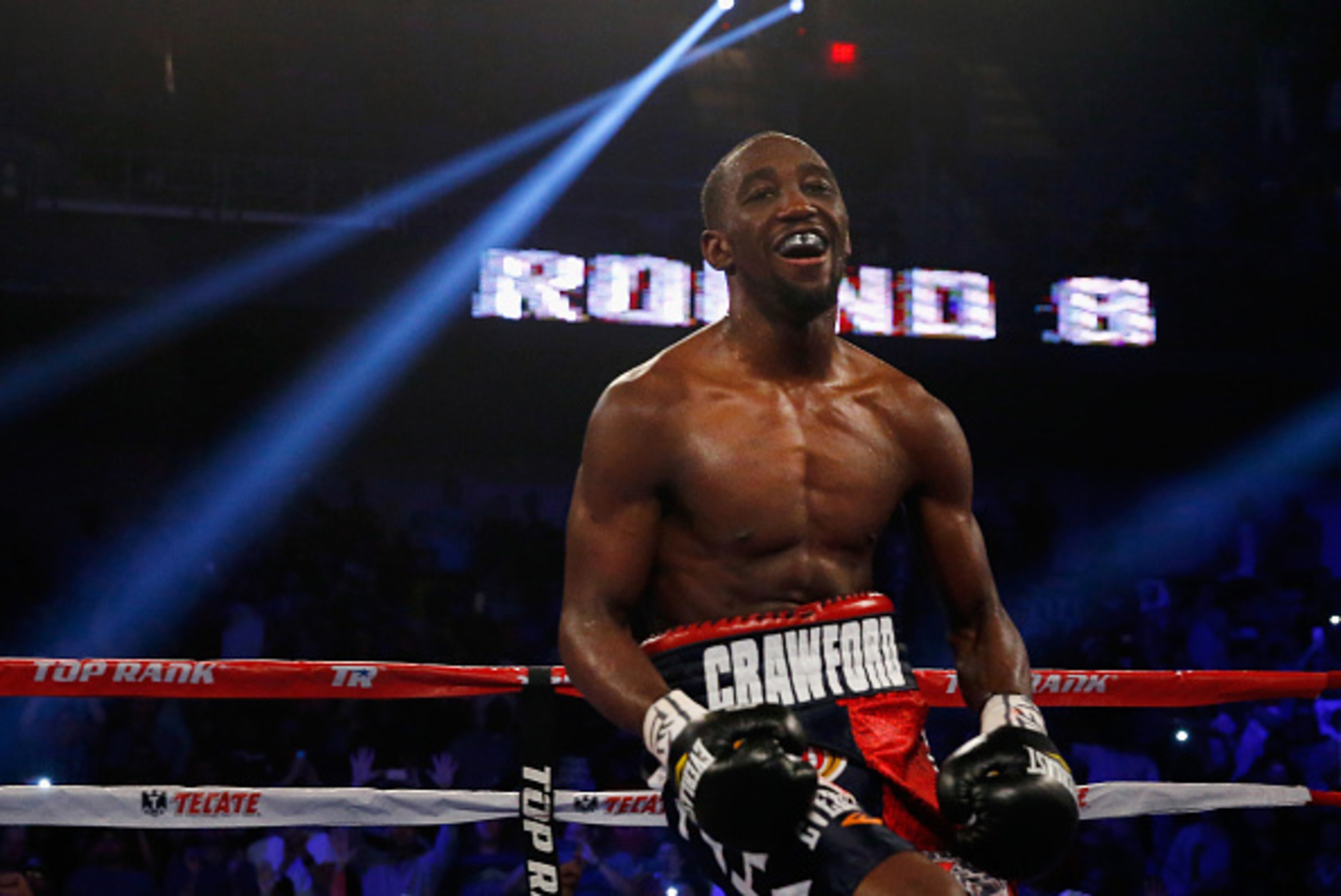 ARLINGTON, TX - APRIL 18:  Terence Crawford celebrates after beating Thomas Dulorme of Puerto Rico in the sixth round in their WBO Jr. Welterweight Title Bout on April 18, 2015 at College Park Center in Arlington, Texas.  (Photo by Tom Pennington/Getty Im