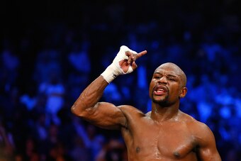 LAS VEGAS, NV - MAY 02:  Floyd Mayweather Jr. reacts after the 12th round against Manny Pacquiao in their welterweight unification championship bout on May 2, 2015 at MGM Grand Garden Arena in Las Vegas, Nevada.  (Photo by Al Bello/Getty Images)