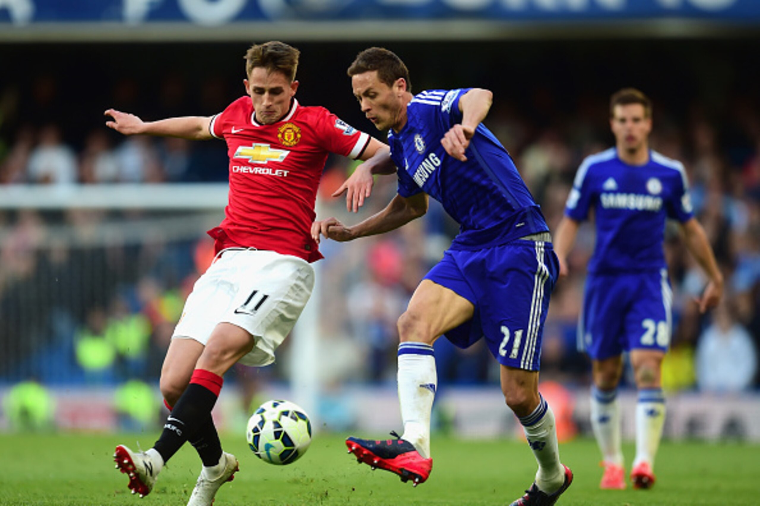 LONDON, ENGLAND - APRIL 18: Adnan Januzaj of Manchester United and Nemanja Matic of Chelsea compete for the ball during the Barclays Premier League match between Chelsea and Manchester United at Stamford Bridge on April 18, 2015 in London, England.  (Phot