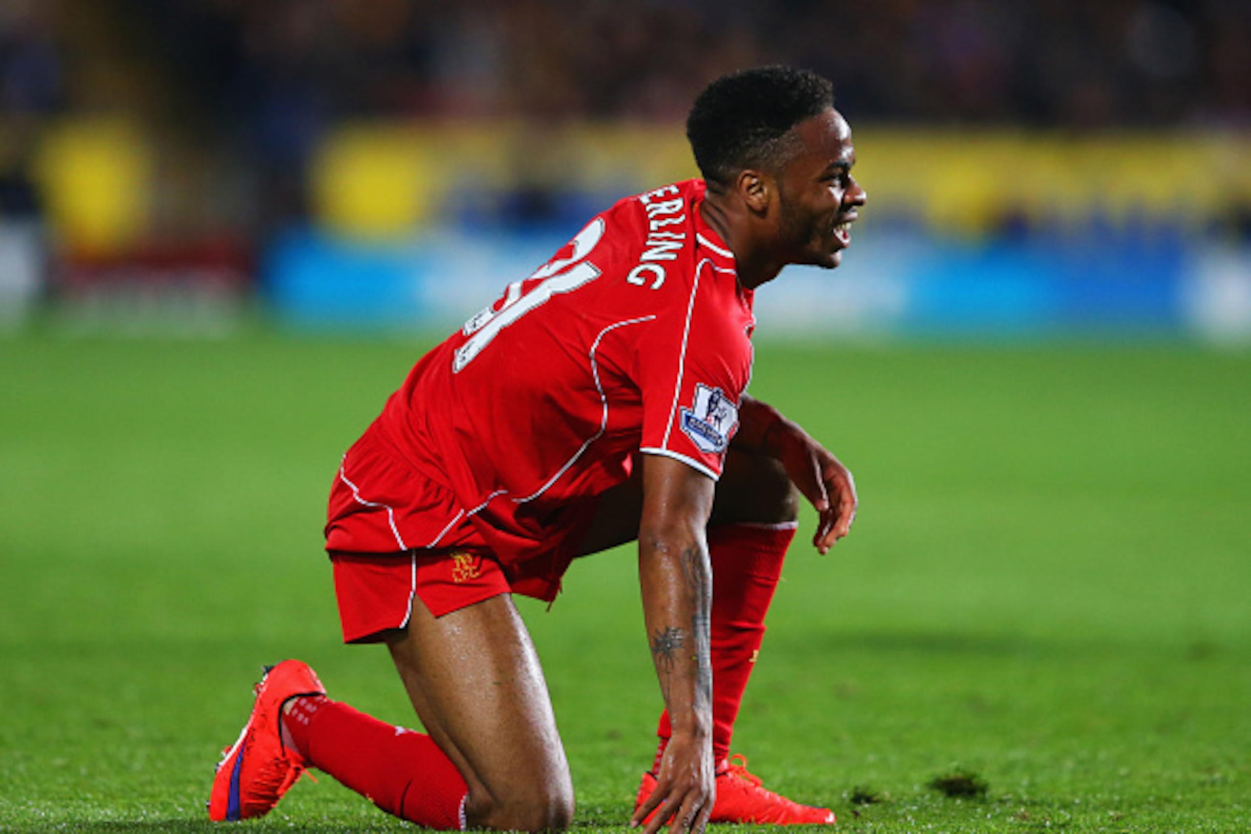 HULL, ENGLAND - APRIL 28:  Raheem Sterling of Liverpool kneels on the turf during the Barclays Premier League match between Hull City and Liverpool at KC Stadium on April 28, 2015 in Hull, England.  (Photo by Alex Livesey/Getty Images)