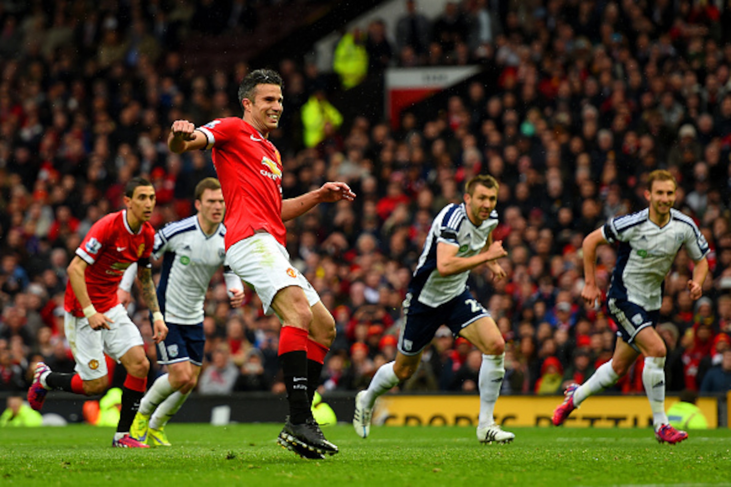 MANCHESTER, ENGLAND - MAY 02:  Robin van Persie of Manchester United reacts after taking a penalty which is saved by Boaz Myhill of West Brom during the Barclays Premier League match between Manchester United and West Bromwich Albion at Old Trafford on Ma