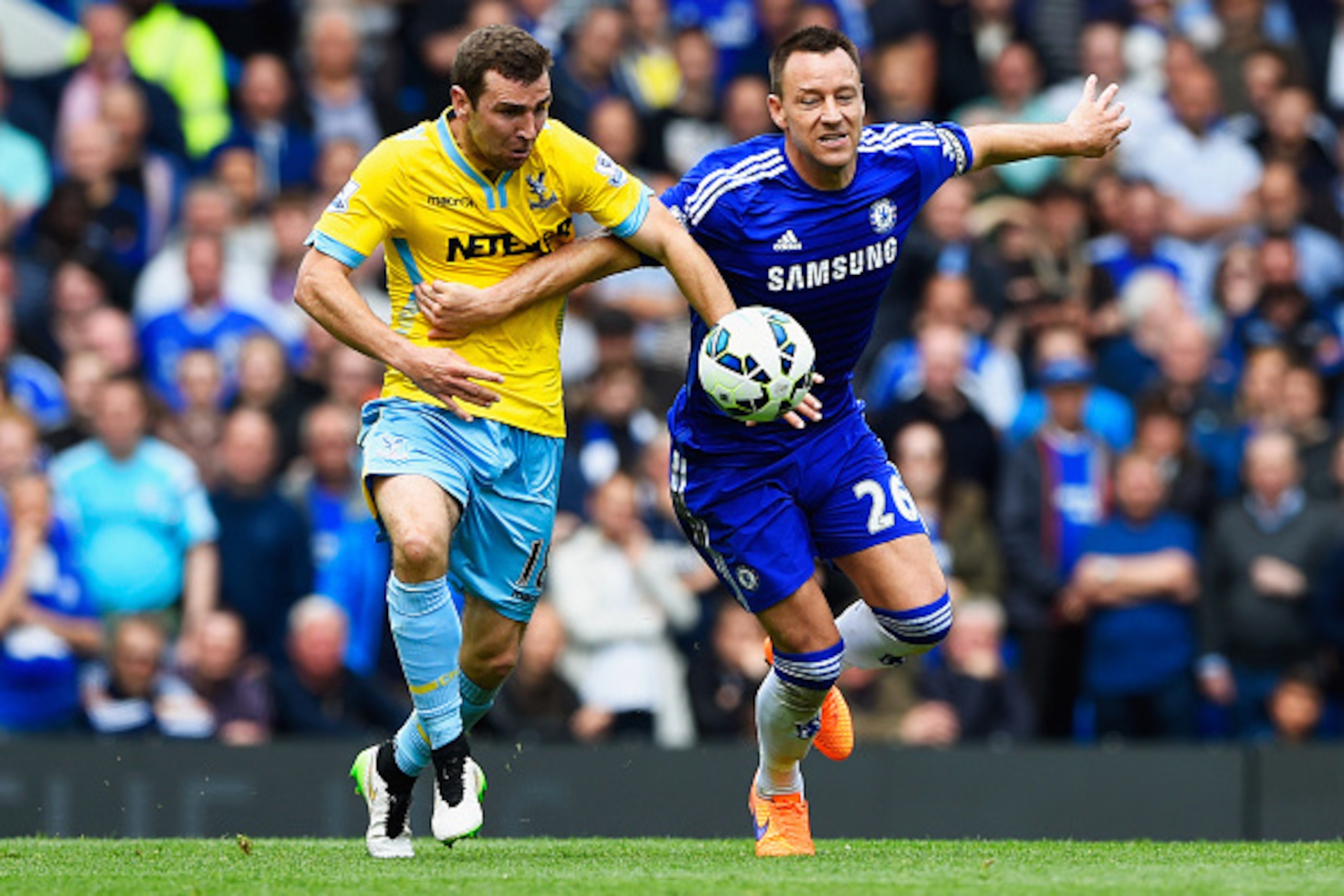 LONDON, ENGLAND - MAY 03:  James McArthur of Crystal Palace tangles with John Terry of Chelsea during the Barclays Premier League match between Chelsea and Crystal Palace at Stamford Bridge on May 3, 2015 in London, England.  (Photo by Mike Hewitt/Getty I