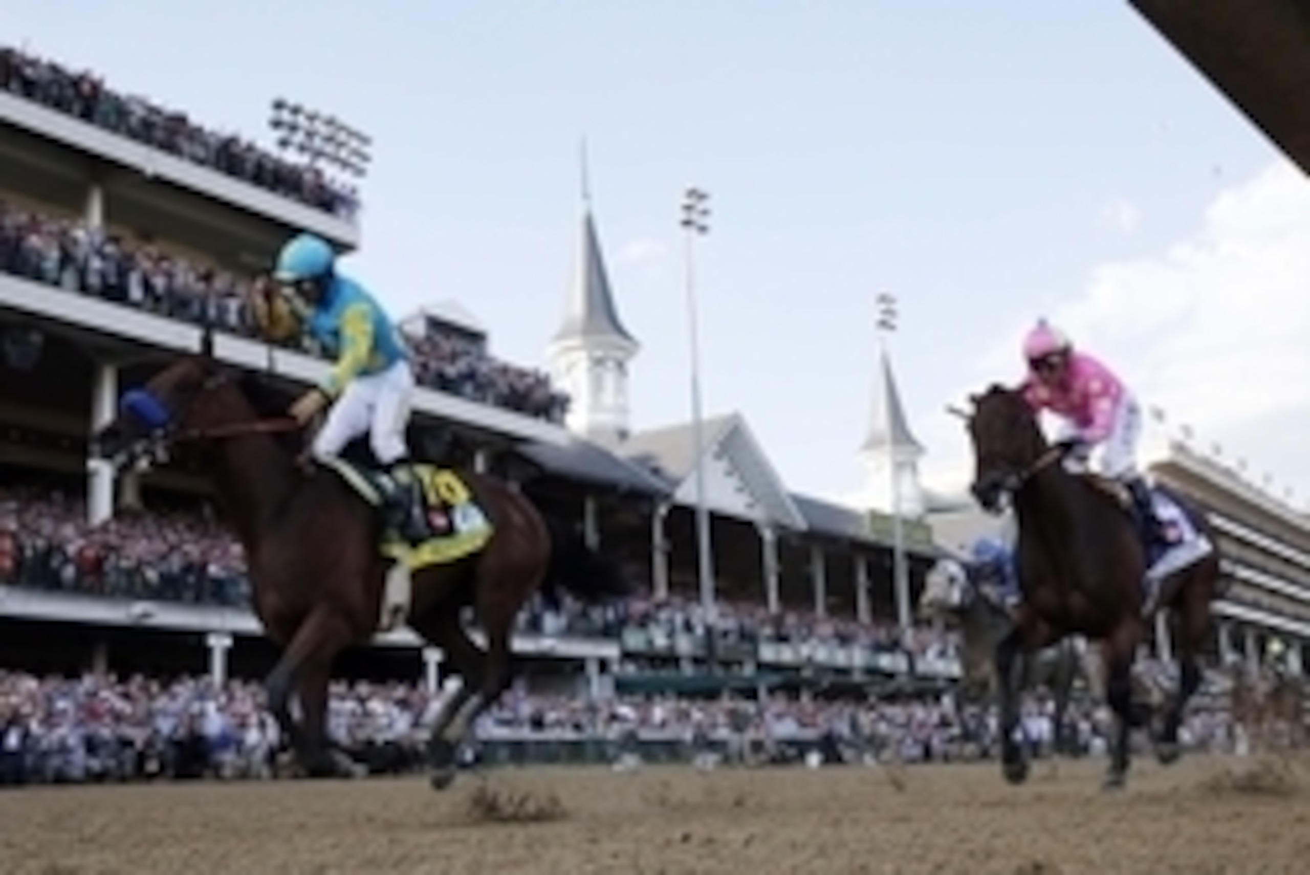 May 2, 2015; Louisville, KY, USA; Victor Espinoza aboard American Pharoah celebrates winning the 141st Kentucky Derby at Churchill Downs. Mandatory Credit: Brian Spurlock-USA TODAY Sports