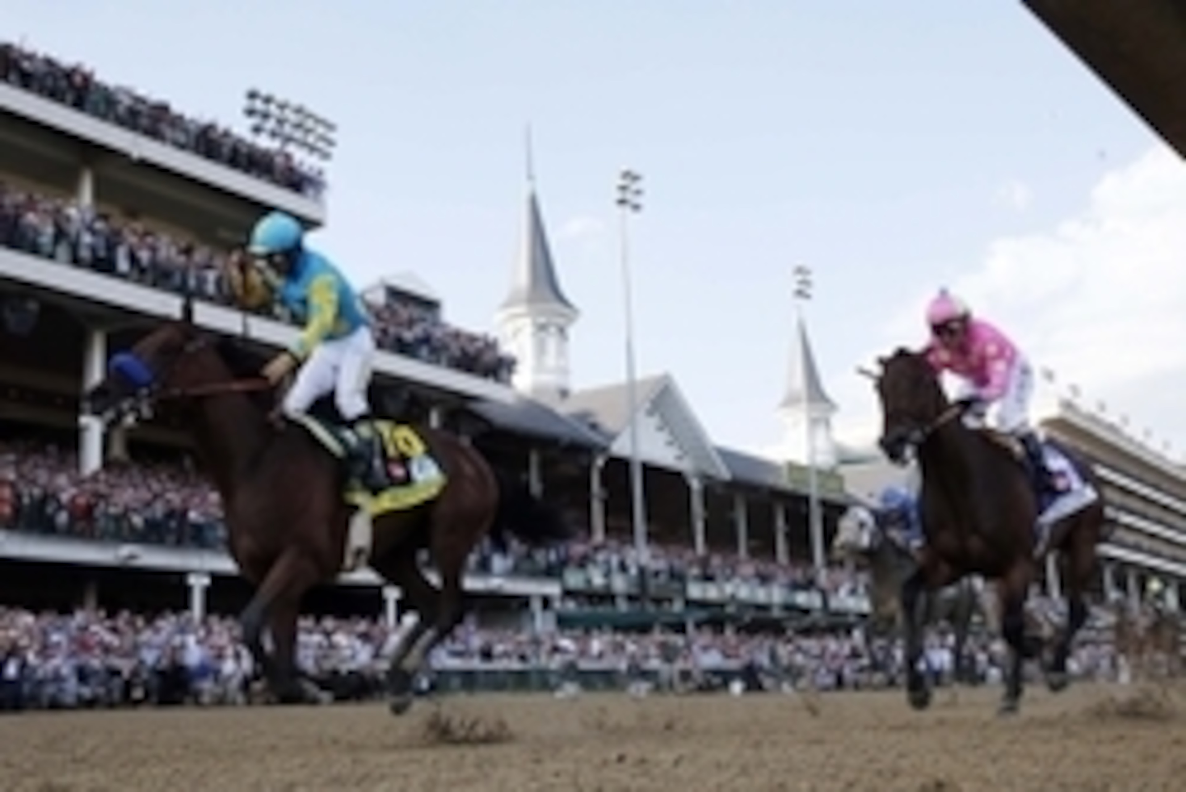 May 2, 2015; Louisville, KY, USA; Victor Espinoza aboard American Pharoah celebrates winning the 141st Kentucky Derby at Churchill Downs. Mandatory Credit: Brian Spurlock-USA TODAY Sports
