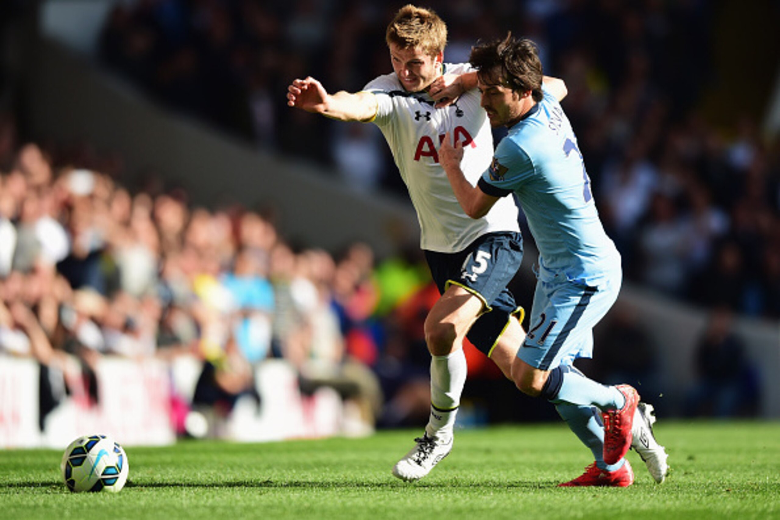 LONDON, ENGLAND - MAY 03:  Eric Dier of Spurs battles with David Silva of Manchester City during the Barclays Premier League match between Tottenham Hotspur and Manchester City at White Hart Lane on May 3, 2015 in London, England.  (Photo by Jamie McDonal