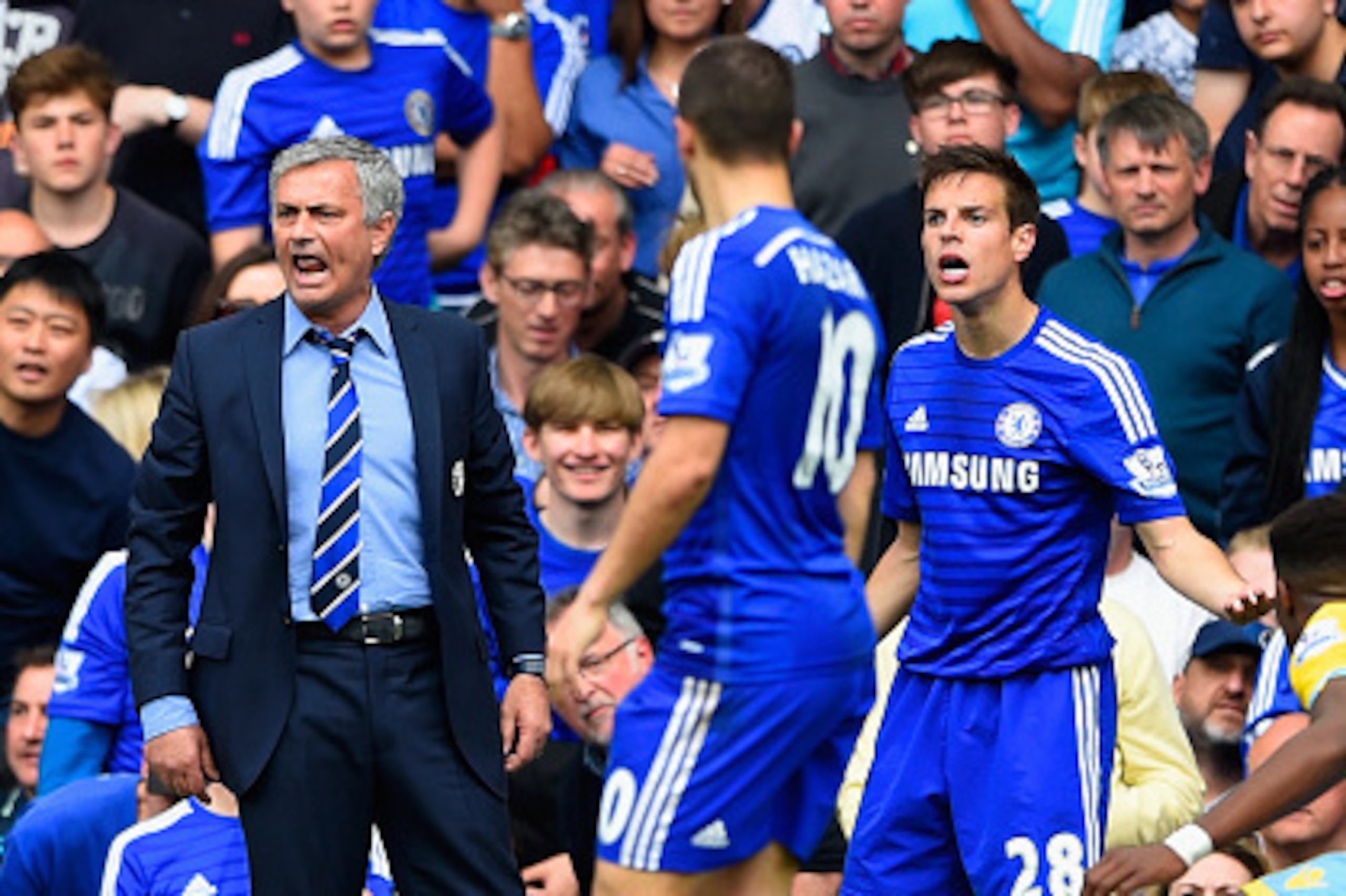 LONDON, ENGLAND - MAY 03:  Jose Mourinho manager of Chelsea and Cesar Azpilicueta of Chelsea (28) react during the Barclays Premier League match between Chelsea and Crystal Palace at Stamford Bridge on May 3, 2015 in London, England.  (Photo by Mike Hewit