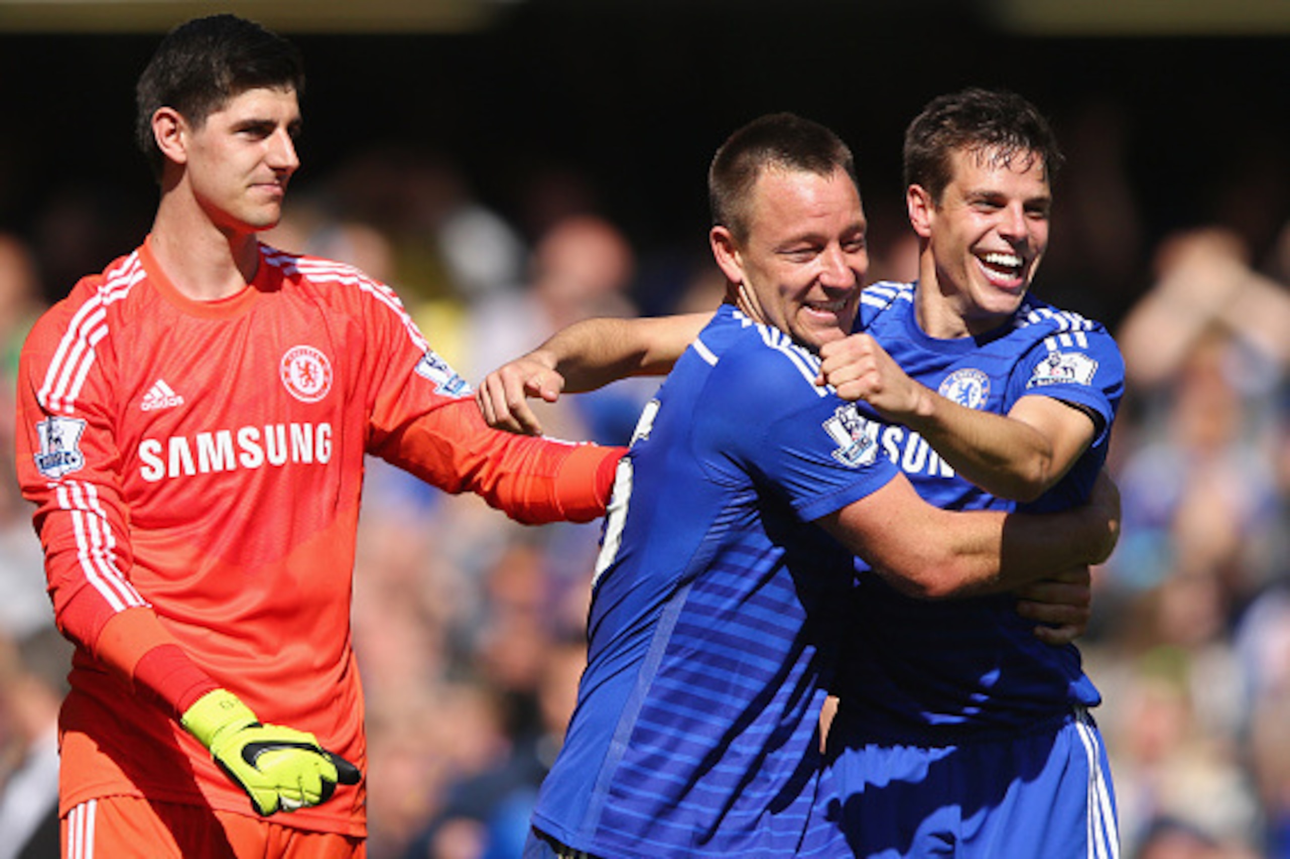 LONDON, ENGLAND - MAY 03: (L-R) Thibaut Courtois, John Terry and Cesar Azpilicueta celebrate winning the Premier League title after the Barclays Premier League match between Chelsea and Crystal Palace at Stamford Bridge on May 3, 2015 in London, England. LONDON, ENGLAND - MAY 03: (L-R) Thibaut Courtois, John Terry and Cesar Azpilicueta celebrate winning the Premier League title after the Barclays Premier League match between Chelsea and Crystal Palace at Stamford Bridge on May 3, 2015 in London, England.