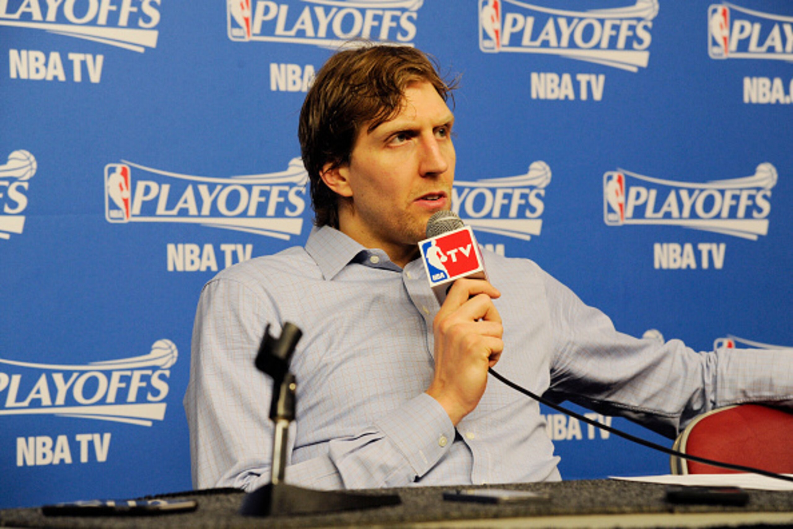 HOUSTON, TX - APRIL 28: Dirk Nowitzki #41 of the Dallas Mavericks speaks to the media after Game Five of the Western Conference Quarterfinals against the Houston Rockets during the NBA Playoffs on April 28, 2015 at the Toyota Center in Houston, Texas. NOT HOUSTON, TX - APRIL 28: Dirk Nowitzki #41 of the Dallas Mavericks speaks to the media after Game Five of the Western Conference Quarterfinals against the Houston Rockets during the NBA Playoffs on April 28, 2015 at the Toyota Center in Houston, Texas. NOT