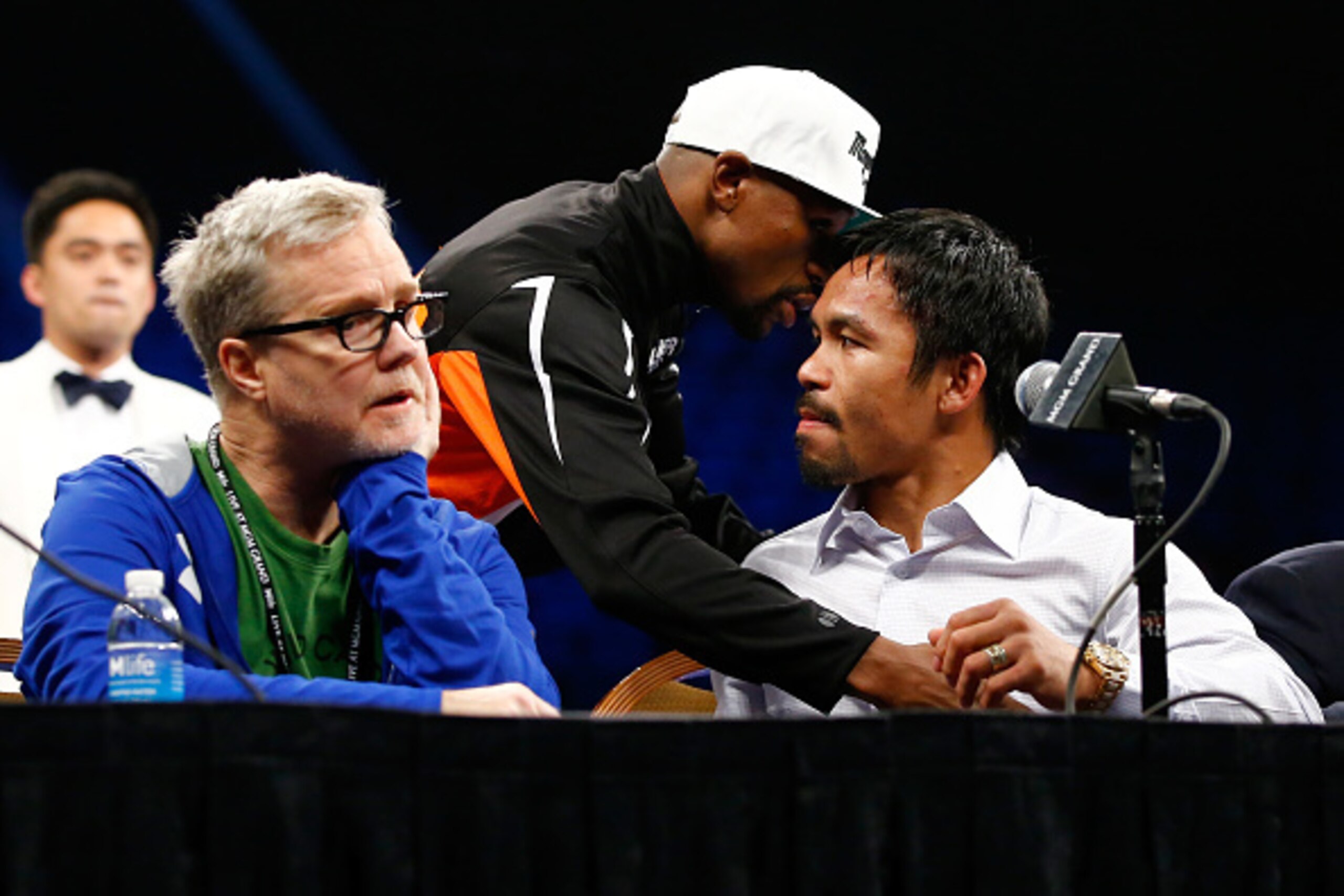 LAS VEGAS, NV - MAY 02:  Floyd Mayweather hugs Manny Pacquiao during their post-fight news conference after Mayweather Jr.'s unanimous decision victory in their welterweight unification championship bout on May 2, 2015 at MGM Grand Garden Arena in Las Veg