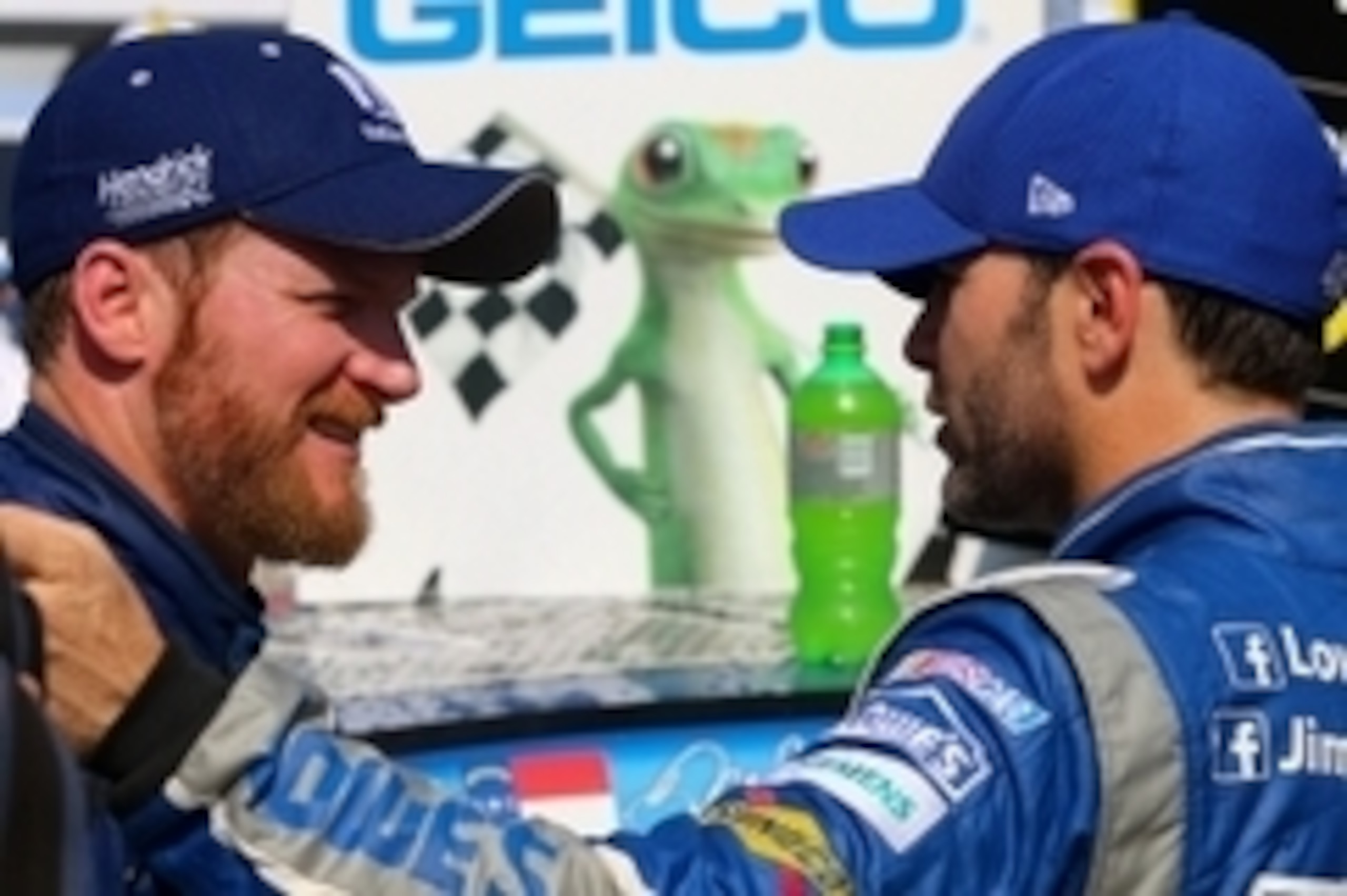 May 3, 2015; Talladega, AL, USA; NASCAR Sprint Cup Series driver Dale Earnhardt Jr. (88) with driver Jimmie Johnson (48) after winning the Geico 500 at Talladega Superspeedway. Mandatory Credit: Randy Sartin-USA TODAY Sports