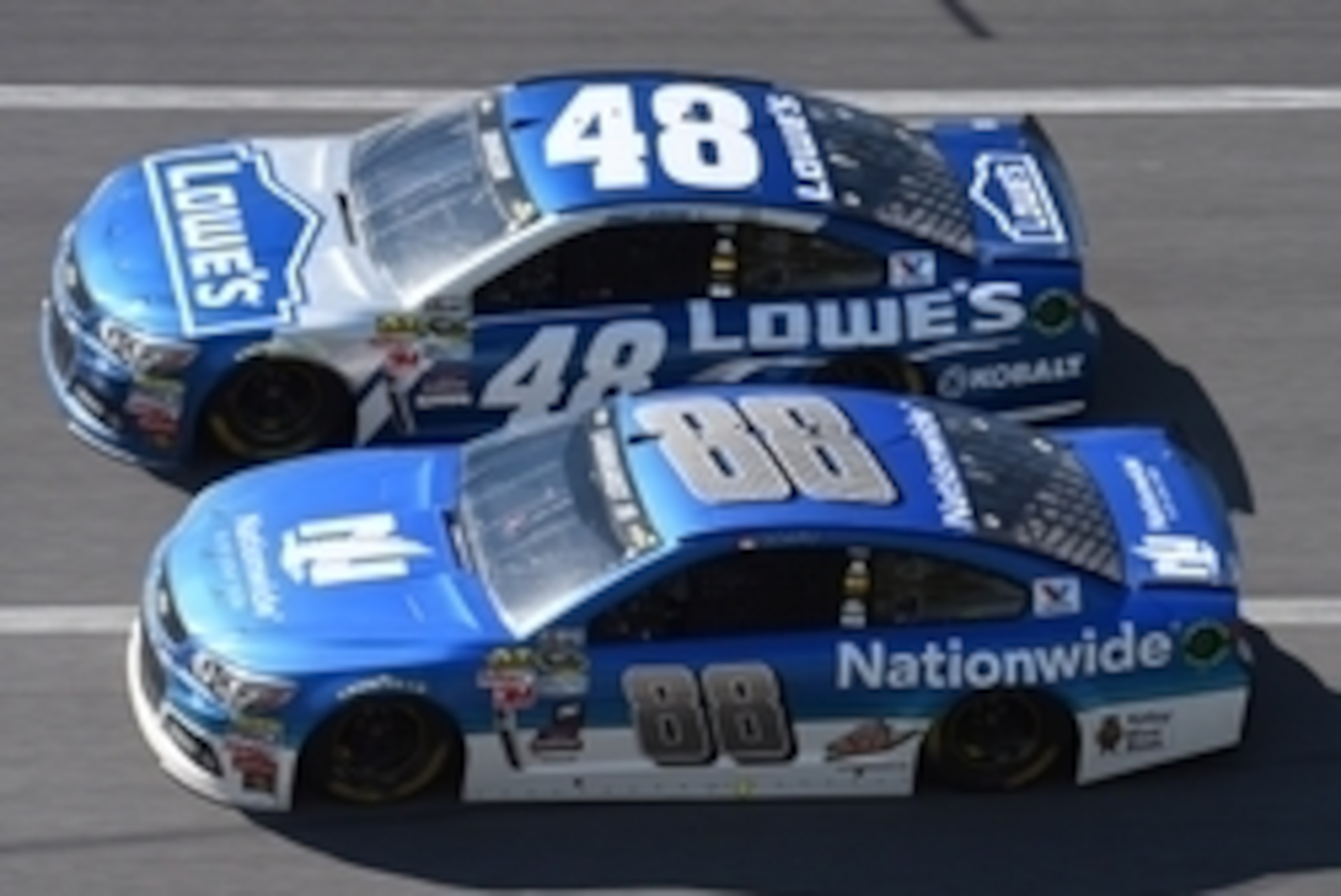 May 3, 2015; Talladega, AL, USA; NASCAR Sprint Cup Series driver Dale Earnhardt Jr. (88) and Jimmie Johnson (48) during the race for the GEICO 500 at Talladega Superspeedway. Mandatory Credit: Mike DiNovo-USA TODAY Sports