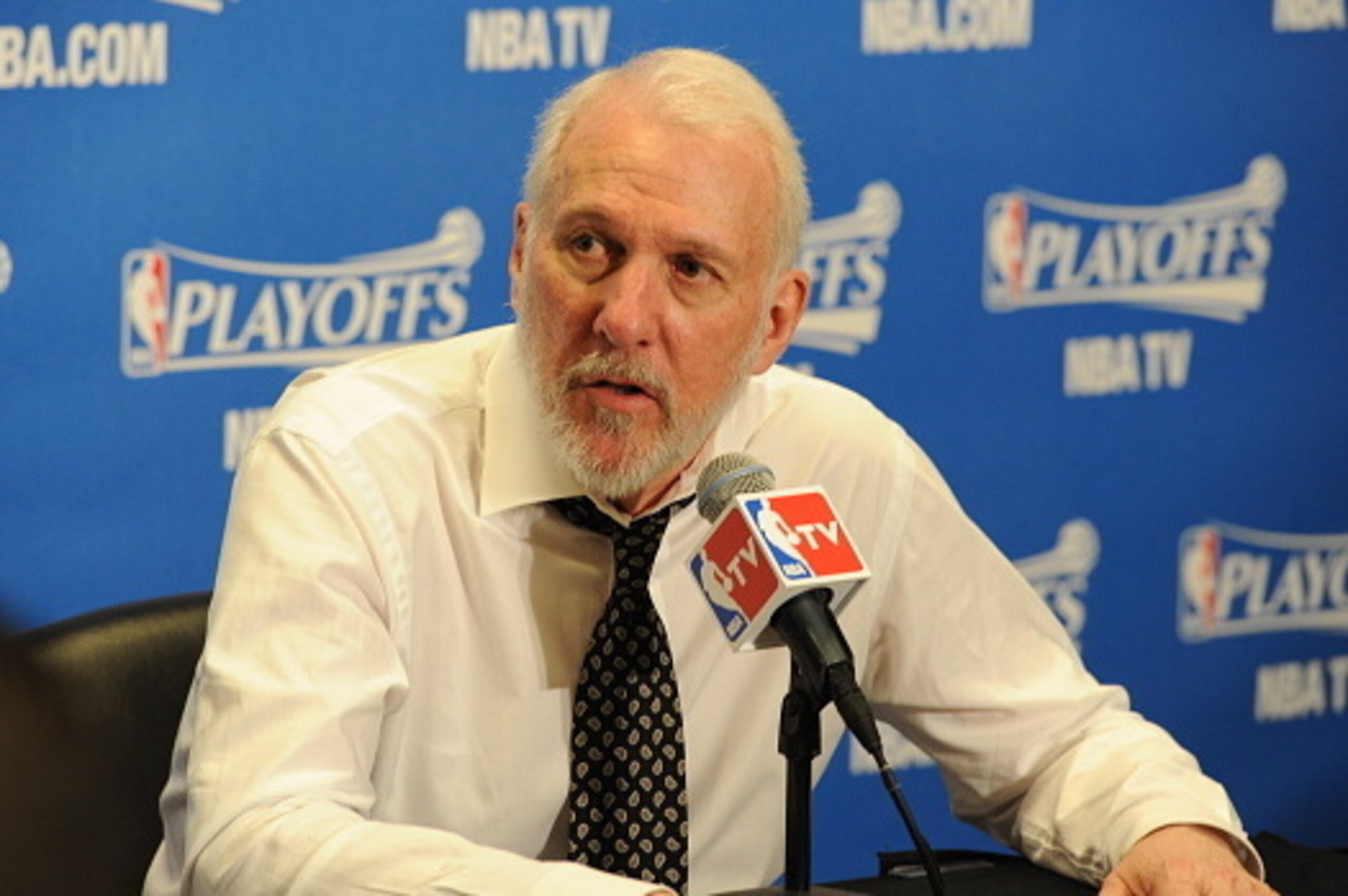 LOS ANGELES, CA - May 2: Head Coach Gregg Popovich of the San Antonio Spurs is interviewed after Game Seven of the Western Conference Quarterfinals against the Los Angeles Clippers during the 2015 NBA Playoffs on May 2, 2015 at Staples Center in Los Ange LOS ANGELES, CA - May 2: Head Coach Gregg Popovich of the San Antonio Spurs is interviewed after Game Seven of the Western Conference Quarterfinals against the Los Angeles Clippers during the 2015 NBA Playoffs on May 2, 2015 at Staples Center in Los Ange