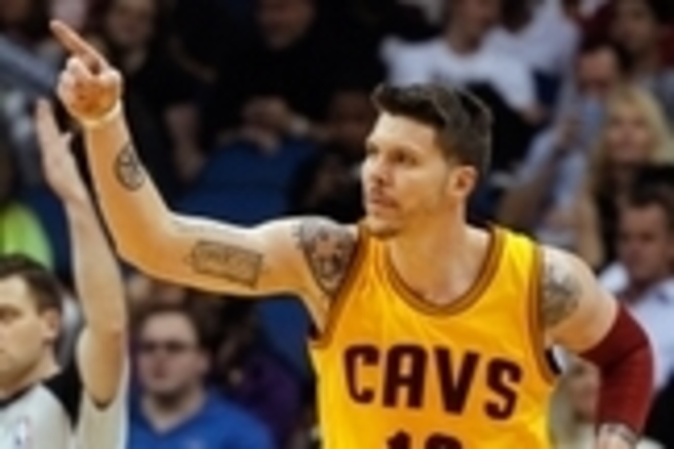 Dec 26, 2014; Orlando, FL, USA; Cleveland Cavaliers forward Mike Miller (18) points and reacts after he made a three pointer against the Orlando Magic during the second half at Amway Center. Cleveland Cavaliers defeated the Orlando Magic 98-89. Mandatory 