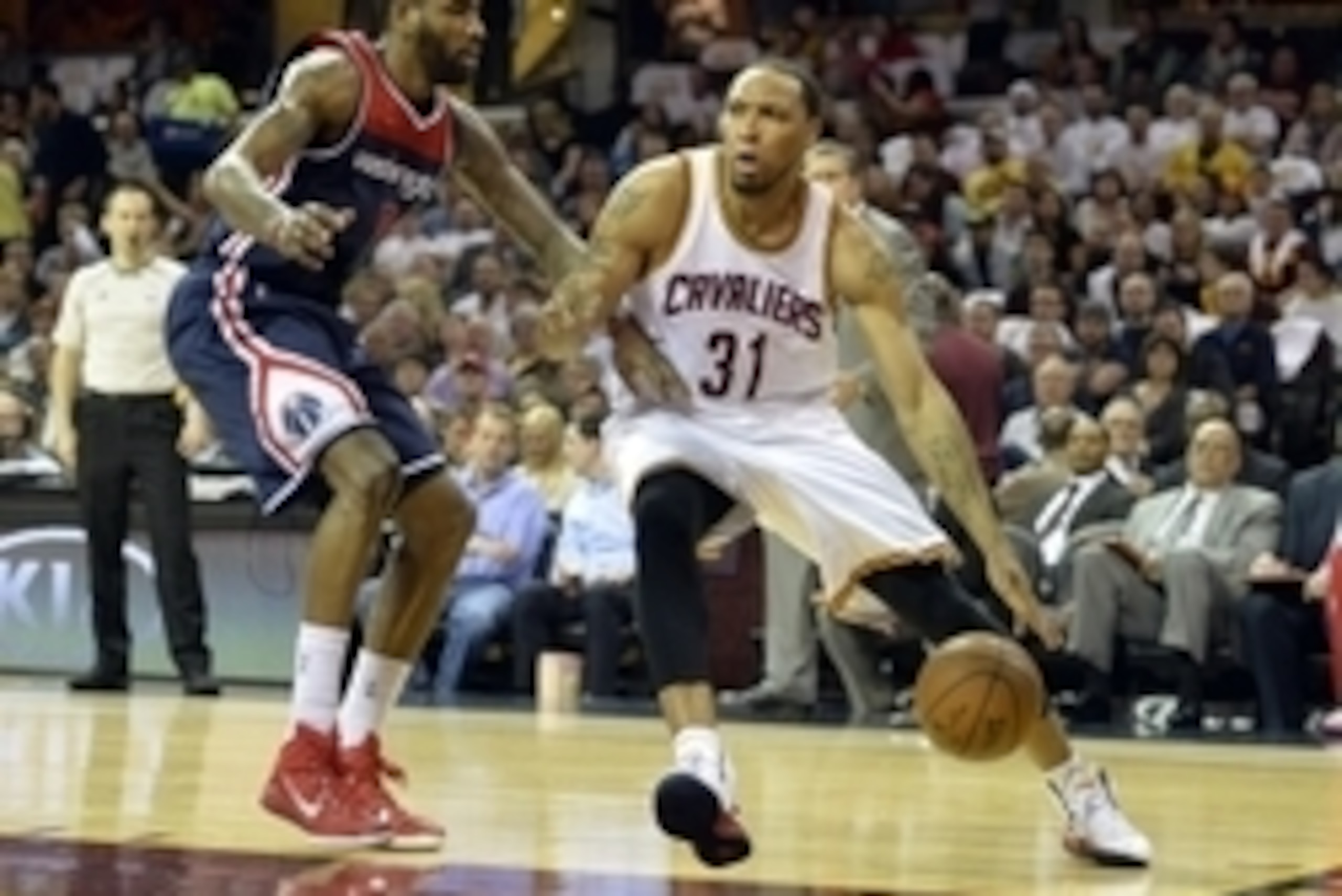 Apr 15, 2015; Cleveland, OH, USA; Cleveland Cavaliers guard Shawn Marion (31) dribbles against Washington Wizards forward Rasual Butler (8) in the third quarter at Quicken Loans Arena. Mandatory Credit: David Richard-USA TODAY Sports