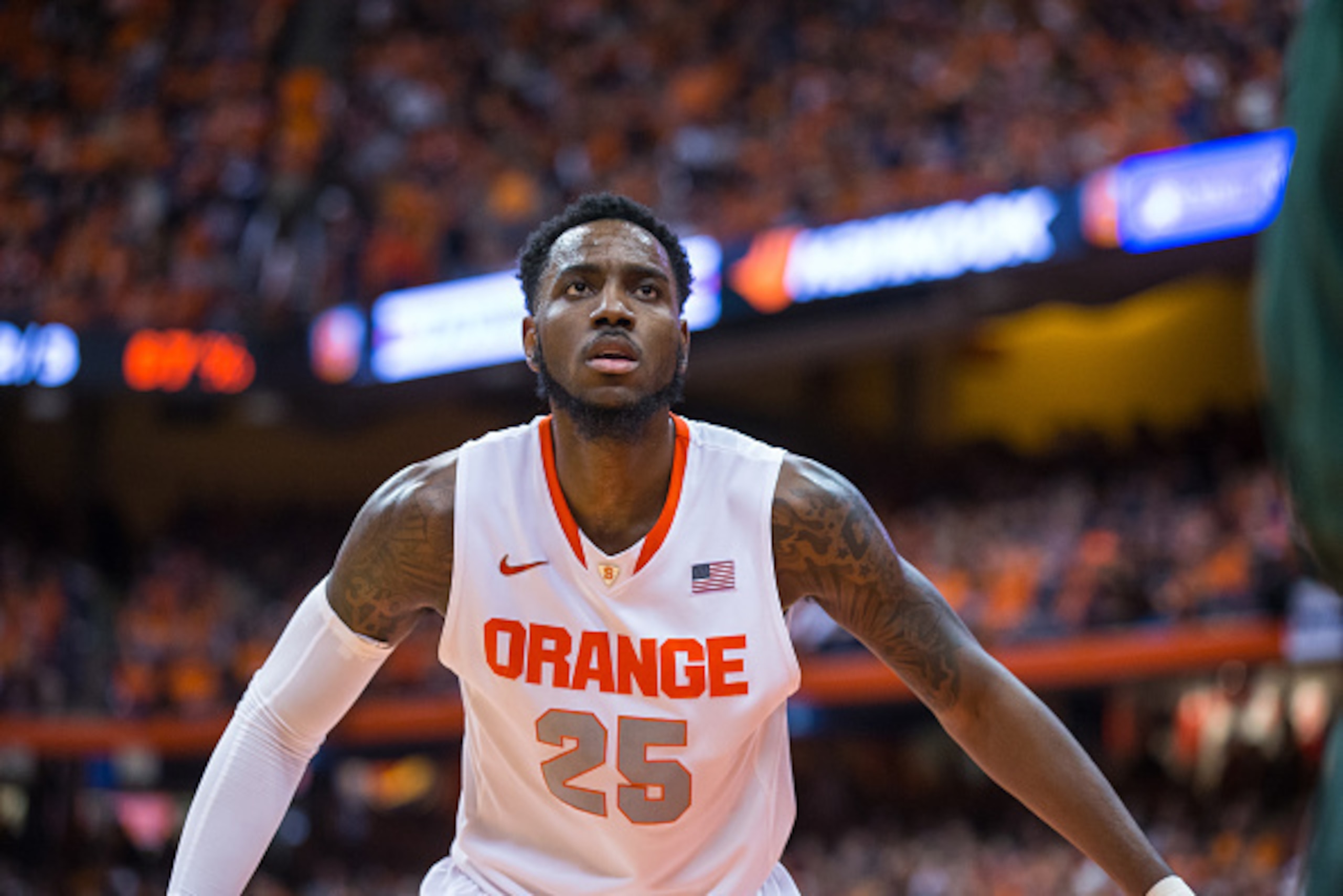 SYRACUSE, NY - JANUARY 24:  Rakeem Christmas #25 of the Syracuse Orange watches as Miami Hurricanes inbounds the ball on January 24, 2015 at The Carrier Dome in Syracuse, New York.  Miami defeated Syracuse 66-62.  (Photo by Brett Carlsen/Getty Images)