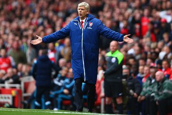 LONDON, ENGLAND - APRIL 26:  Arsene Wenger manager of Arsenal reacts during the Barclays Premier League match between Arsenal and Chelsea at Emirates Stadium on April 26, 2015 in London, England.  (Photo by Paul Gilham/Getty Images)