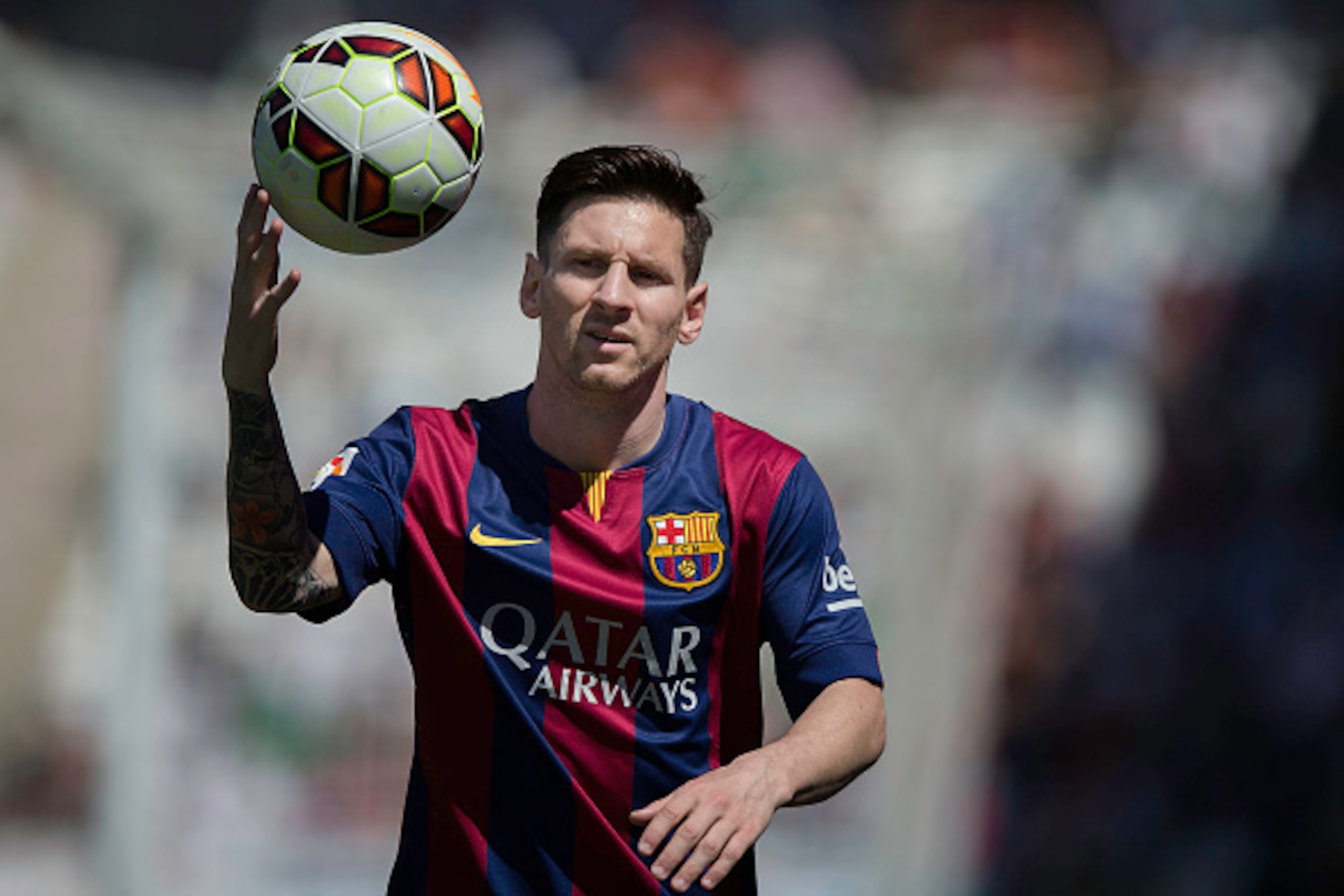 CORDOBA, SPAIN - MAY 02:  Lionel Messi of FC Barcelona holds the ball during the La Liga match between Cordoba CF and Barcelona FC at El Arcangel stadium on May 2, 2015 in Cordoba, Spain.  (Photo by Gonzalo Arroyo Moreno/Getty Images)