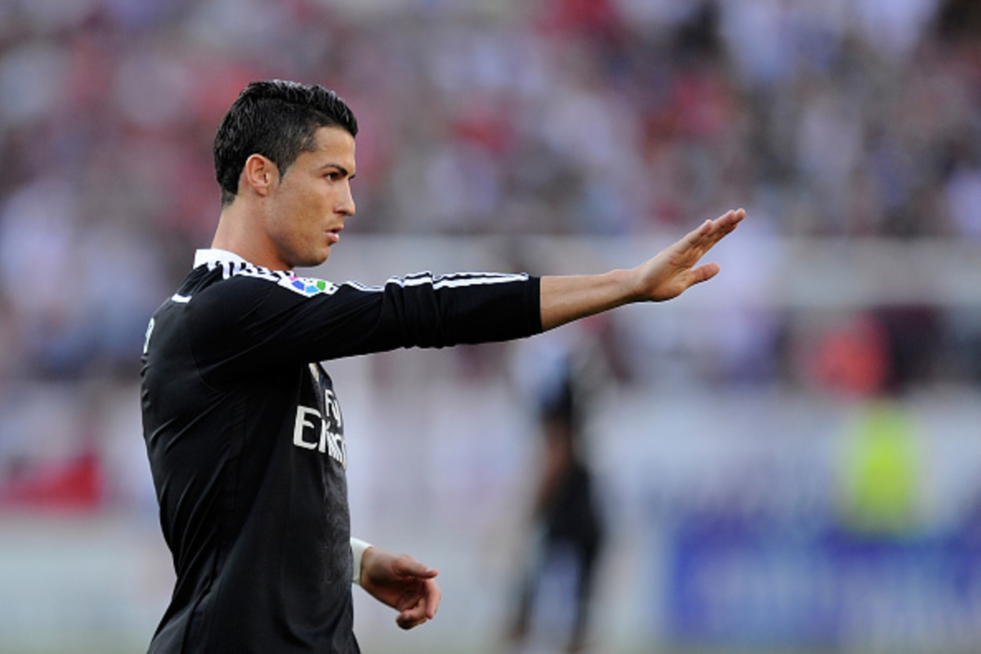 SEVILLE, SPAIN - MAY 02:  Cristiano Ronaldo of Real Madrid reacts during the La Liga match between Sevilla FC and Real Madrid CF at Estadio Ramon Sanchez Pizjuan on May 2, 2015 in Seville, Spain.  (Photo by Denis Doyle/Getty Images)