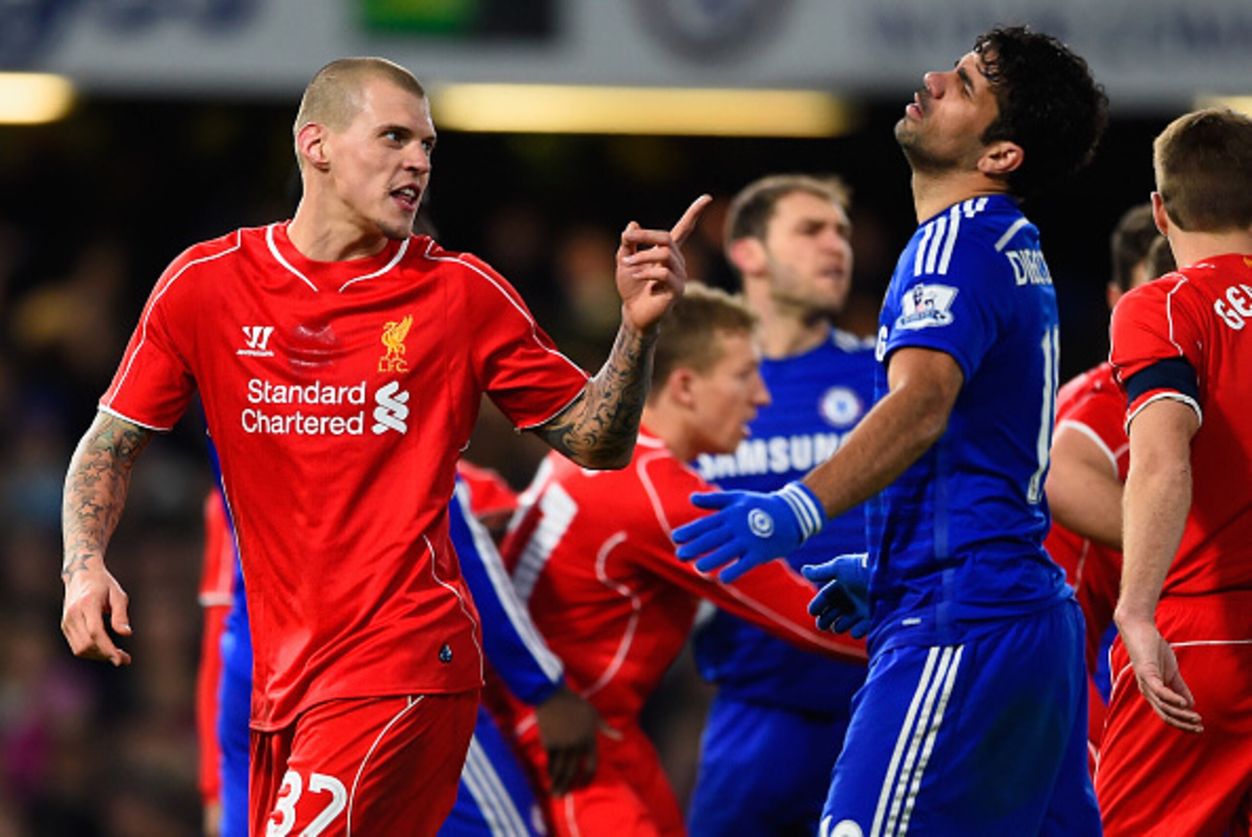 LONDON, ENGLAND - JANUARY 27:  Martin Skrtel of Liverpool clashes with Diego Costa of Chelsea during the Capital One Cup Semi-Final second leg between Chelsea and Liverpool at Stamford Bridge on January 27, 2015 in London, England.  (Photo by Mike Hewitt/
