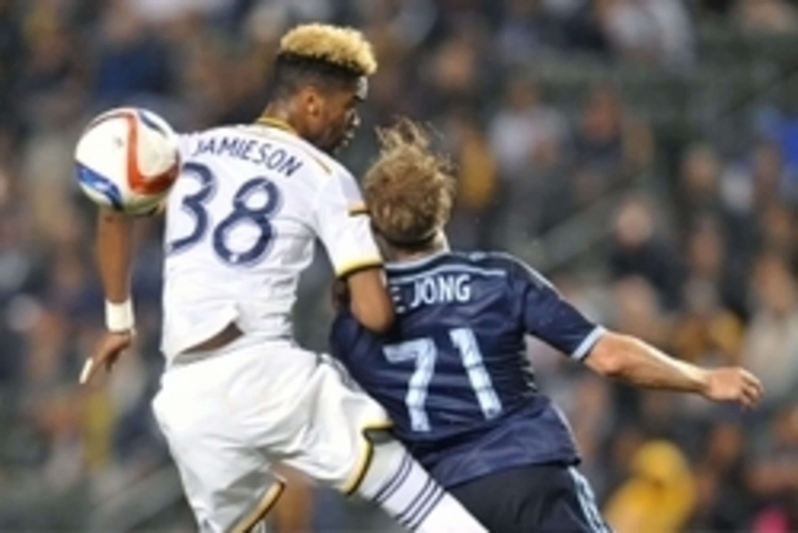 April 18, 2015; Carson, CA, USA; Los Angeles Galaxy forward Bradford Jamieson (38) plays for the ball against Sporting KC defender Marcel de Jong (71) during the second half at StubHub Center. Mandatory Credit: Gary A. Vasquez-USA TODAY Sports April 18, 2015; Carson, CA, USA; Los Angeles Galaxy forward Bradford Jamieson (38) plays for the ball against Sporting KC defender Marcel de Jong (71) during the second half at StubHub Center. Mandatory Credit: Gary A. Vasquez-USA TODAY Sports