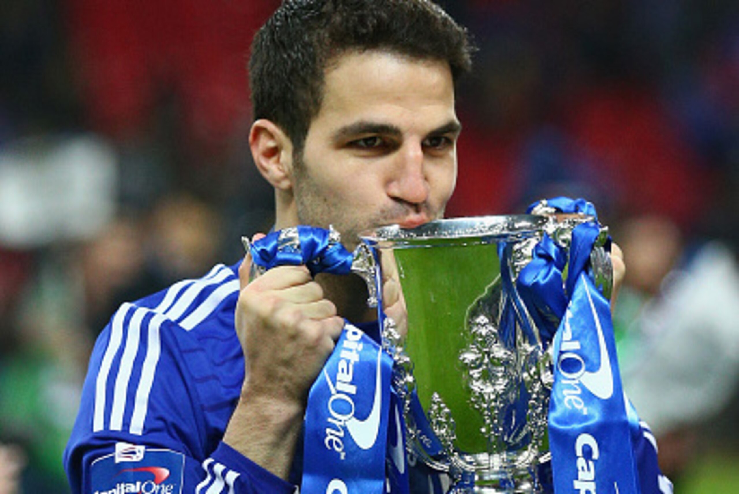 LONDON, ENGLAND - MARCH 01:  Cesc Fabregas of Chelsea poses with the trophy during the Capital One Cup Final match between Chelsea and Tottenham Hotspur at Wembley Stadium on March 1, 2015 in London, England.  (Photo by Clive Mason/Getty Images)