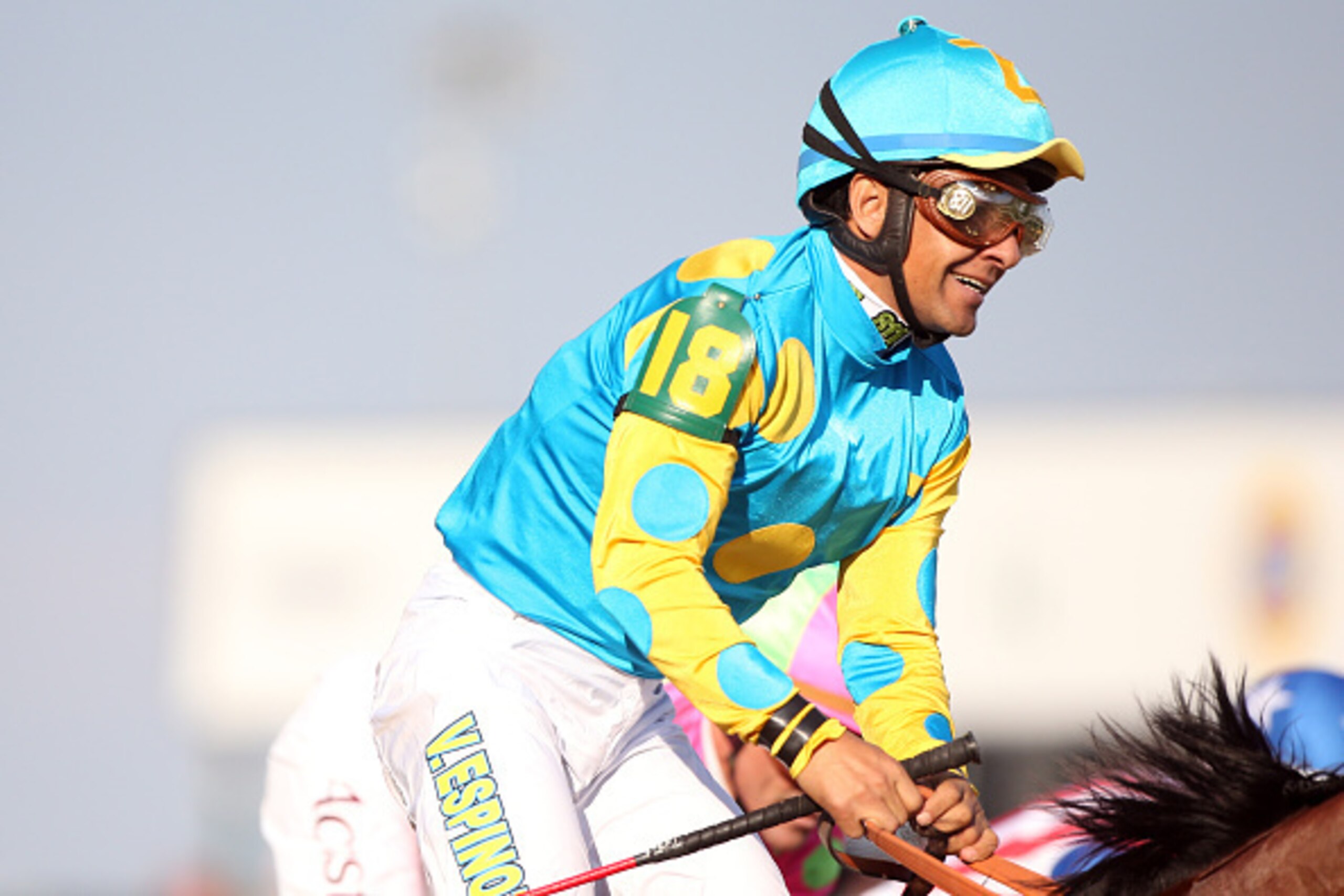 LOUISVILLE, KY - MAY 02:  Jockey Victor Espinoza celebrates atop of American Pharoah #18 on his way to winners circle after winning the 141st running of the Kentucky Derby at Churchill Downs on May 2, 2015 in Louisville, Kentucky.  (Photo by Chris Graythe