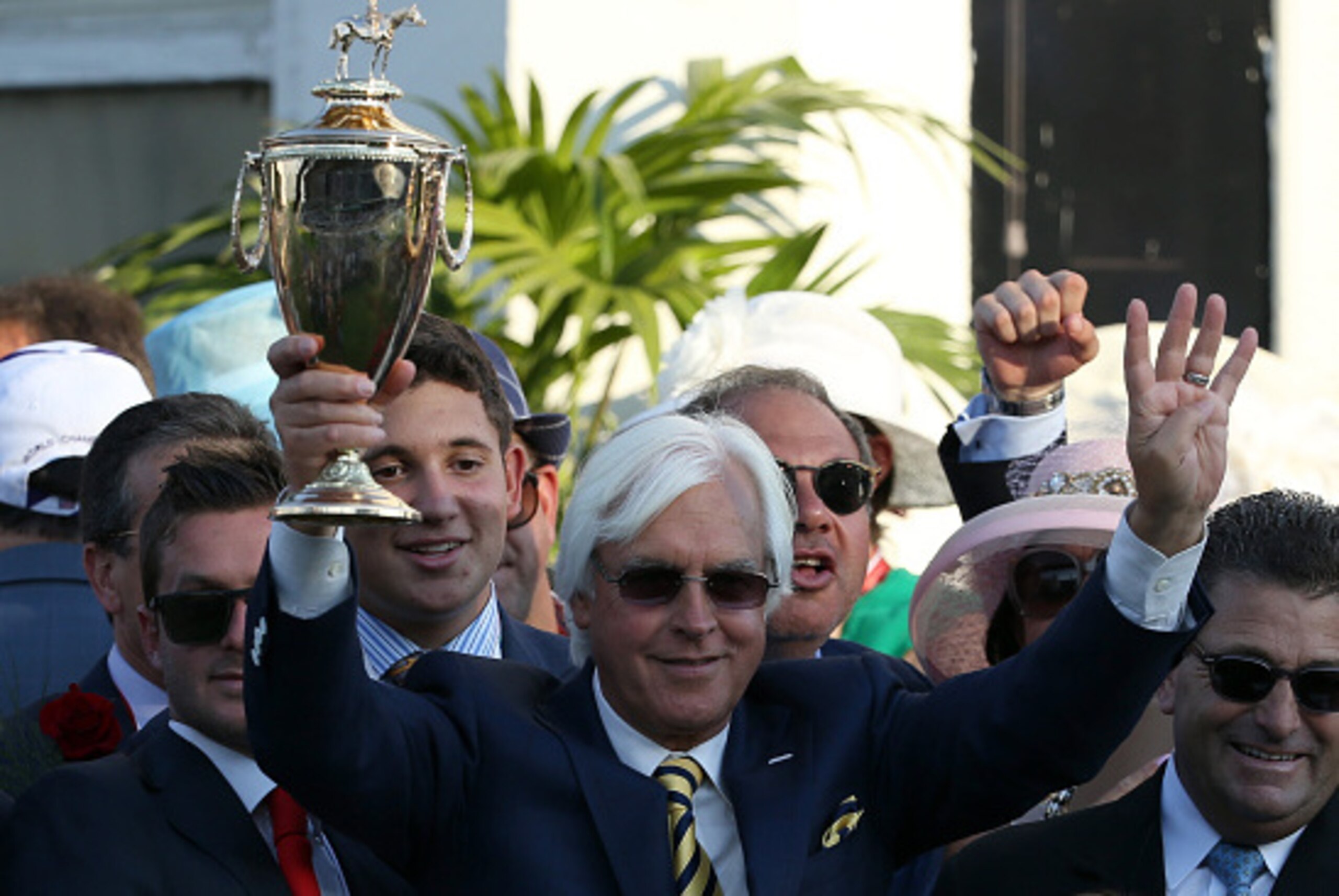LOUISVILLE, KY - MAY 02:  Trainer Bob Baffert of American Pharoah #18 celebrates with the trophy in winners circle after winning the 141st running of the Kentucky Derby at Churchill Downs on May 2, 2015 in Louisville, Kentucky.  (Photo by Andy Lyons/Getty