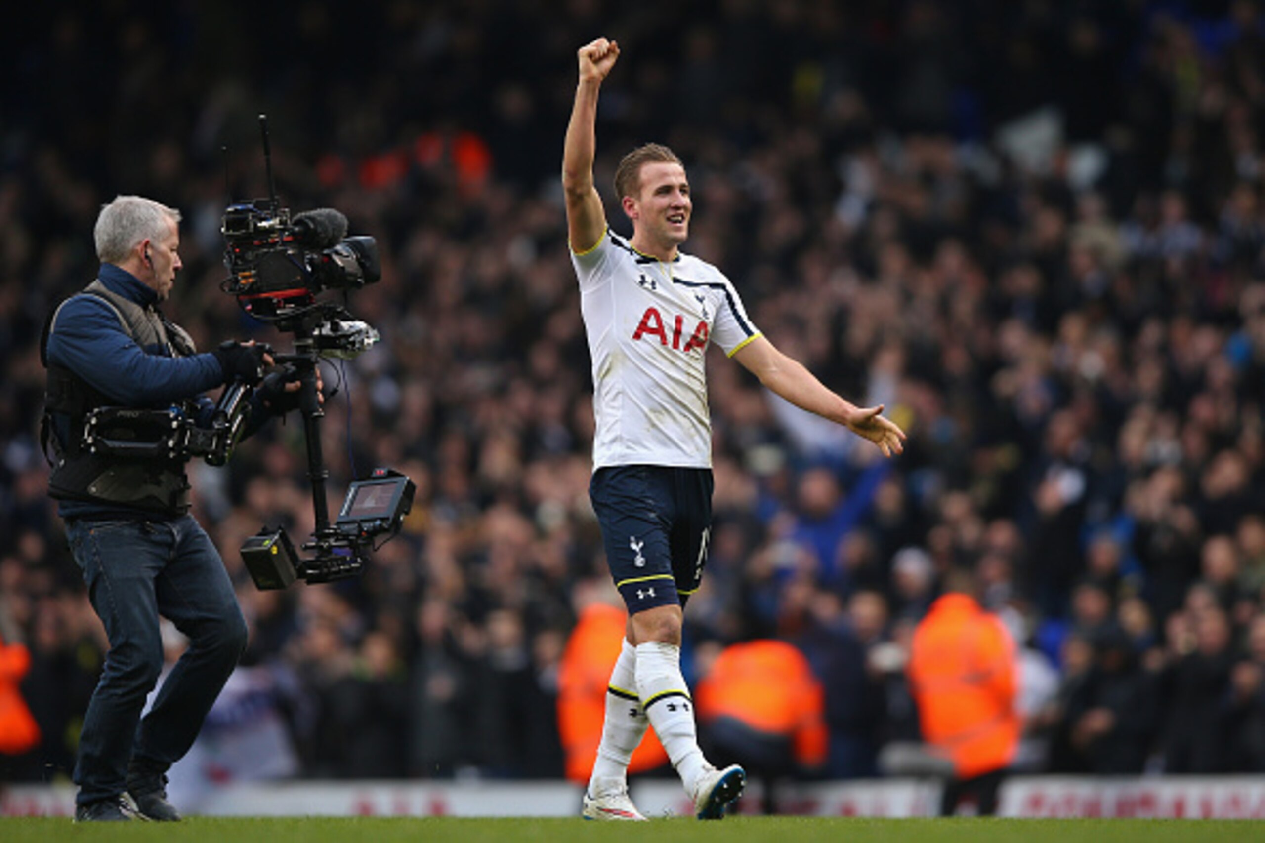 LONDON, ENGLAND - FEBRUARY 07:  Harry Kane of Tottenham Hotspur celebrates as a television camera films him at the end of the Barclays Premier League match between Tottenham Hotspur and Arsenal at White Hart Lane on February 7, 2015 in London, England.  (