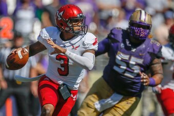 SEATTLE, WA - SEPTEMBER 06:  Quarterback Vernon Adams Jr. #3 of the Eastern Washington Eagles rushes against the Washington Huskies on September 6, 2014 at Husky Stadium in Seattle, Washington.  (Photo by Otto Greule Jr/Getty Images)