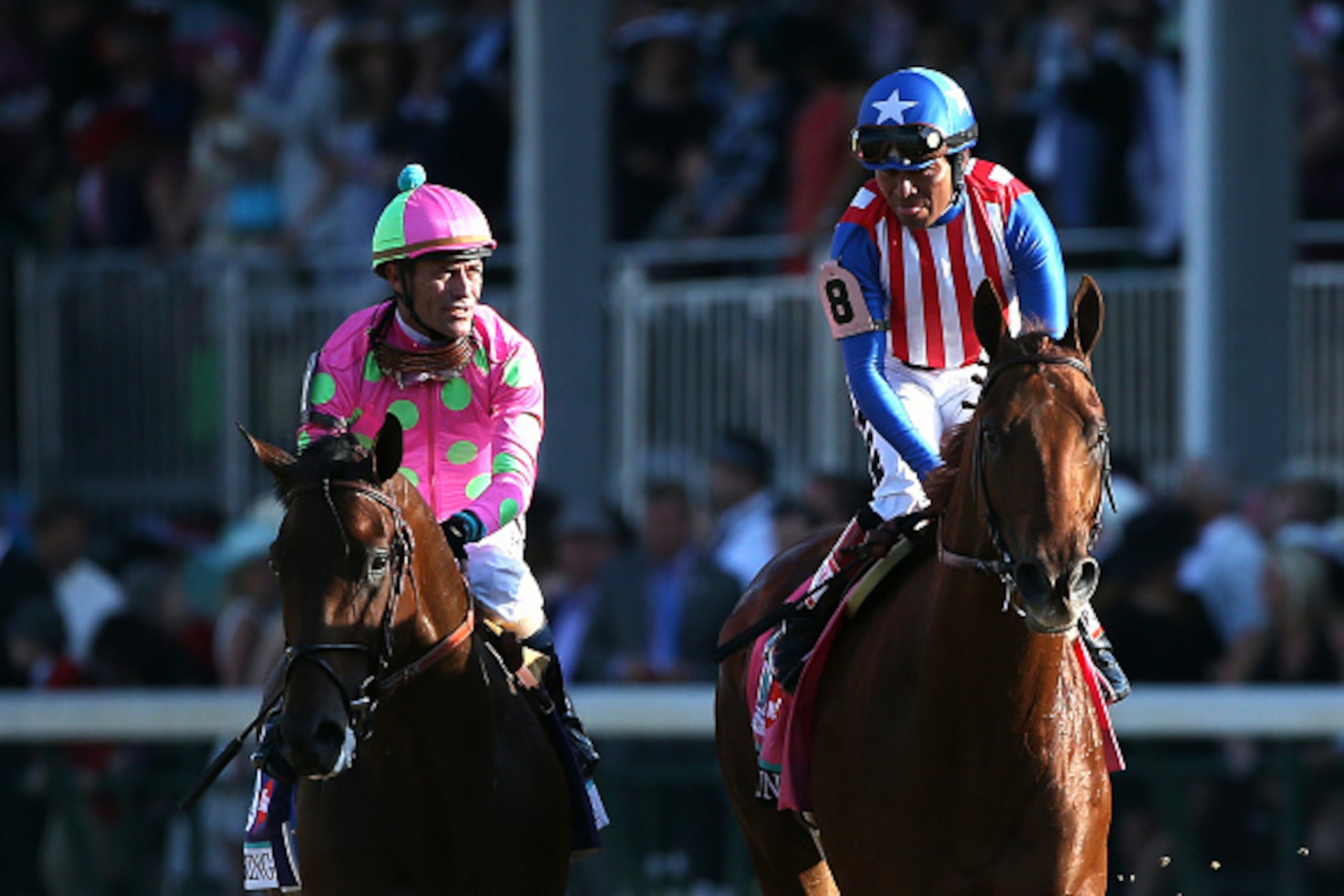LOUISVILLE, KY - MAY 02: Jockey Martin Garcia atop of Dortmund #8 talks with Jockey Gary Stevens atop Firing Line #10 after placing second and thrid in the 141st running of the Kentucky Derby at Churchill Downs on May 2, 2015 in Louisville, Kentucky. (P LOUISVILLE, KY - MAY 02: Jockey Martin Garcia atop of Dortmund #8 talks with Jockey Gary Stevens atop Firing Line #10 after placing second and thrid in the 141st running of the Kentucky Derby at Churchill Downs on May 2, 2015 in Louisville, Kentucky. (P