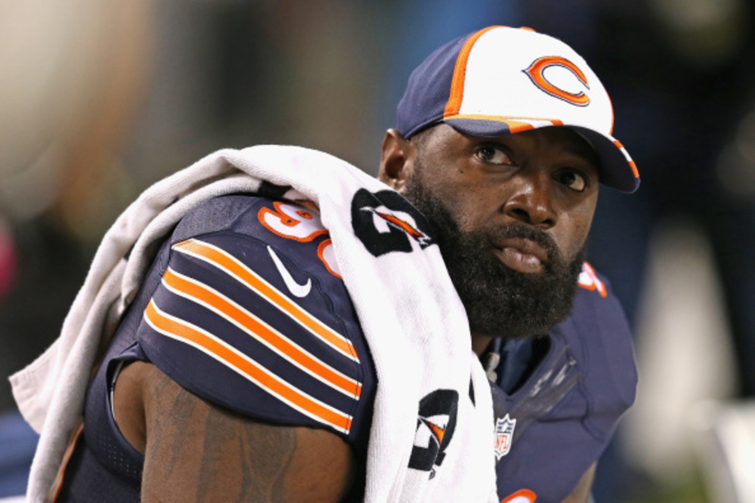 CHICAGO, IL - AUGUST 14:  Jeremiah Ratliff #90 of the Chicago Bears sits on the bench during a preseason game against the Jacksonville Jaguars at Soldier Field on August 14, 2014 in Chicago, Illinois.  The Bears defeated the Jaguars 20-19.  (Photo by Jona