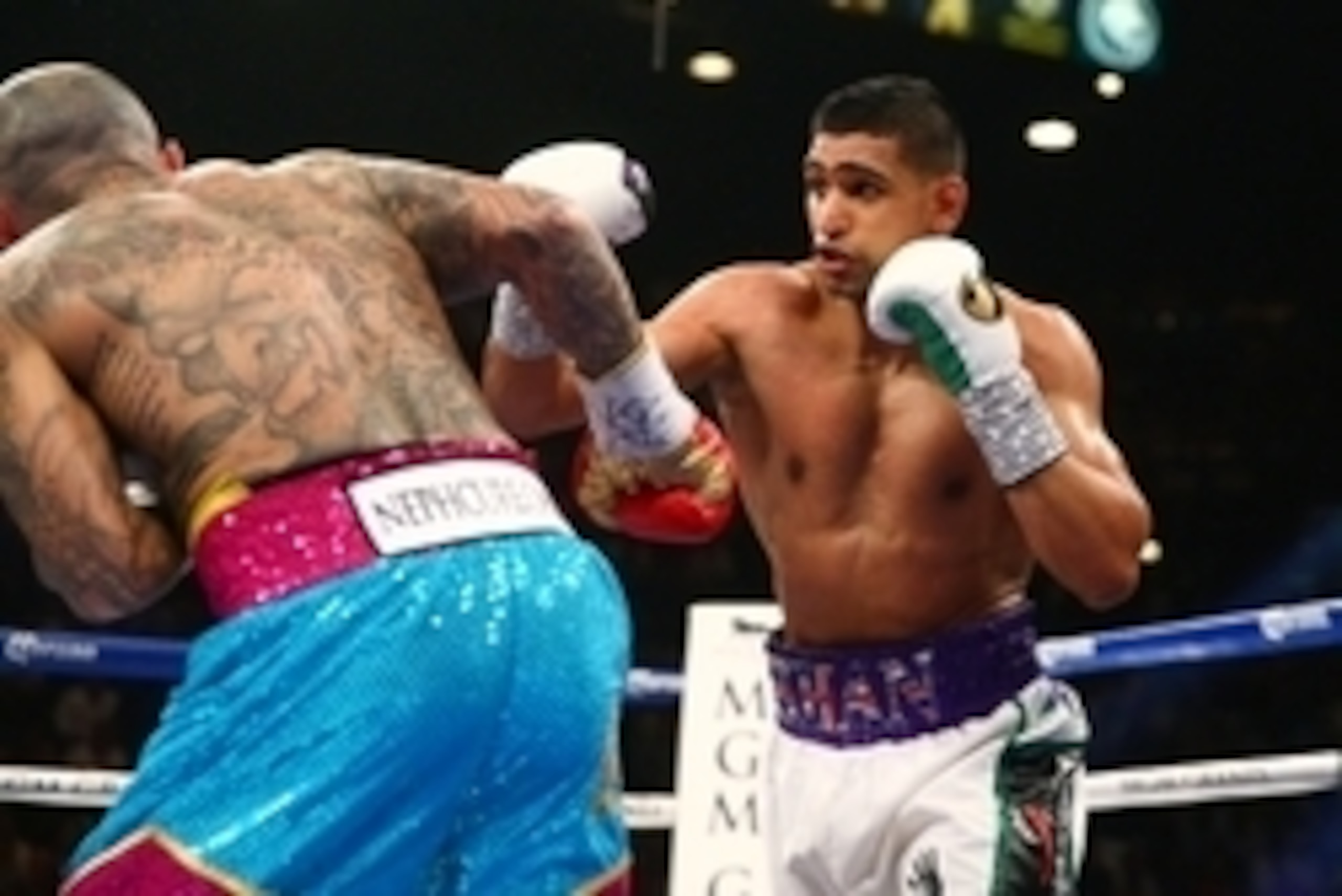 May 3, 2014; Las Vegas, NV, USA; Amir Khan (right) against Luis Collazo during their fight at MGM Grand. Mandatory Credit: Mark J. Rebilas-USA TODAY Sports